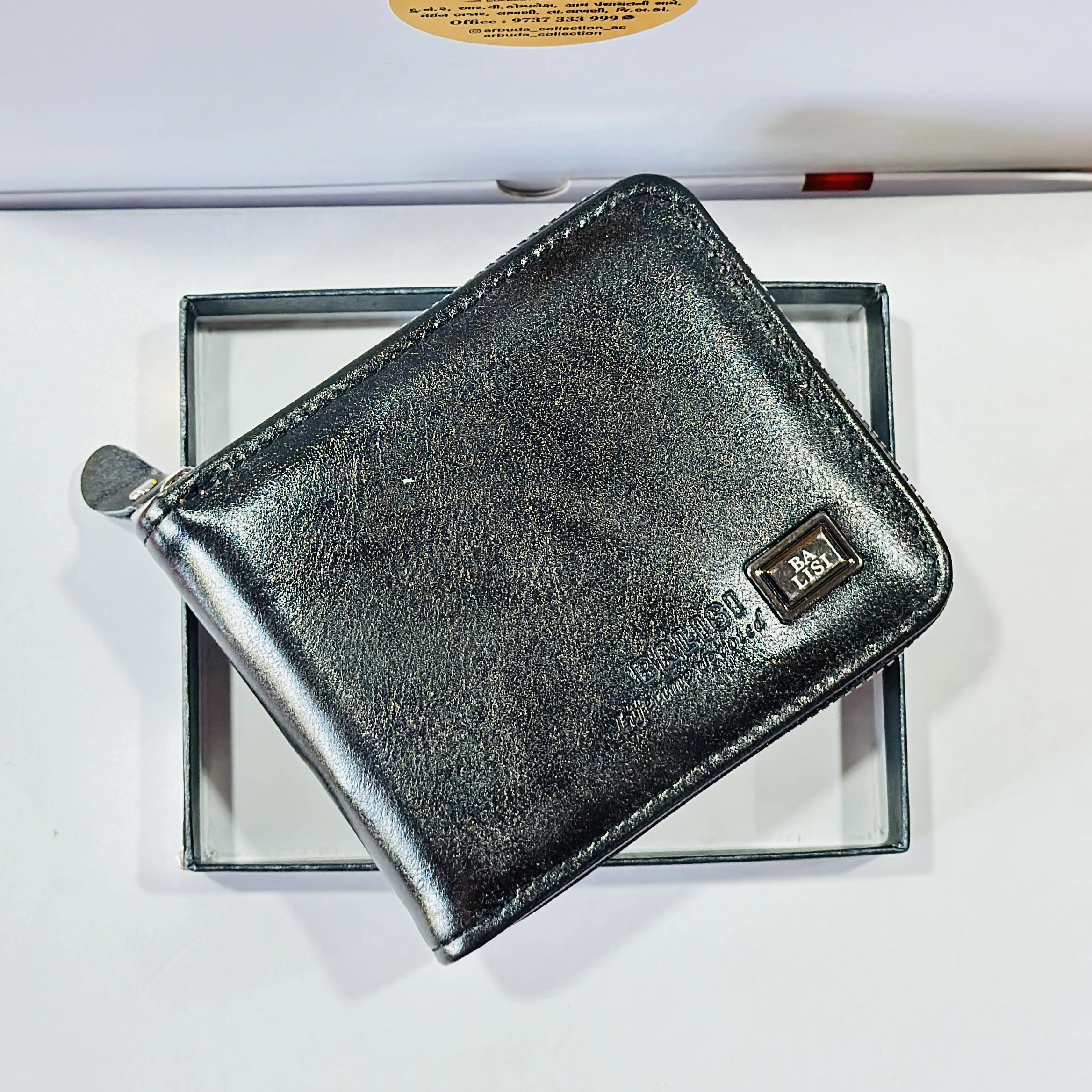 Black bi-fold leather wallet branded "BA LISI".