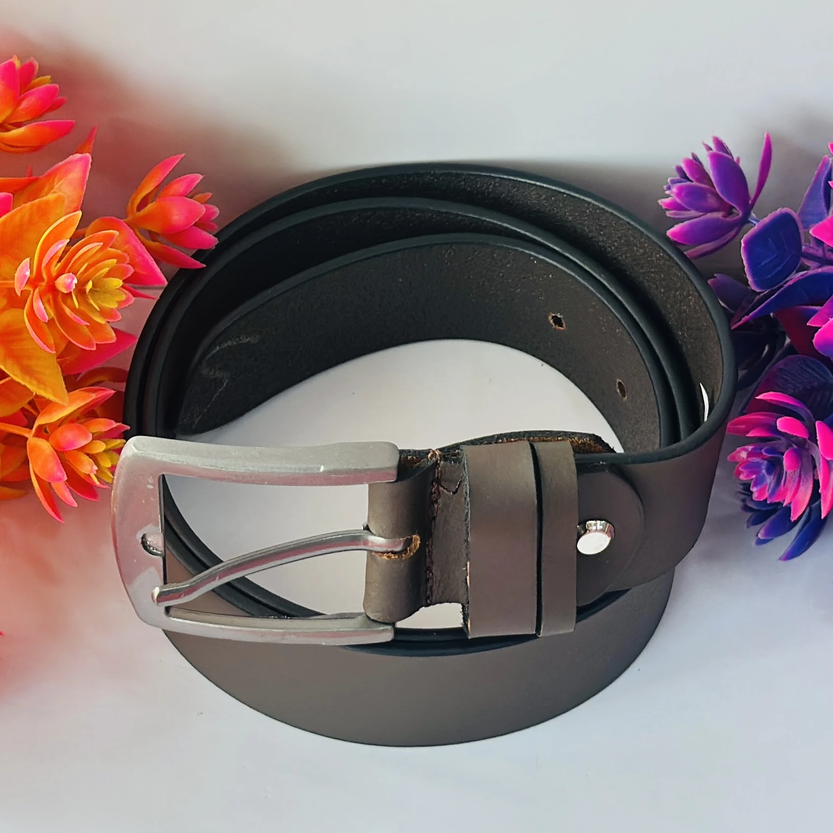 men's brown leather belt with a silver-tone buckle.