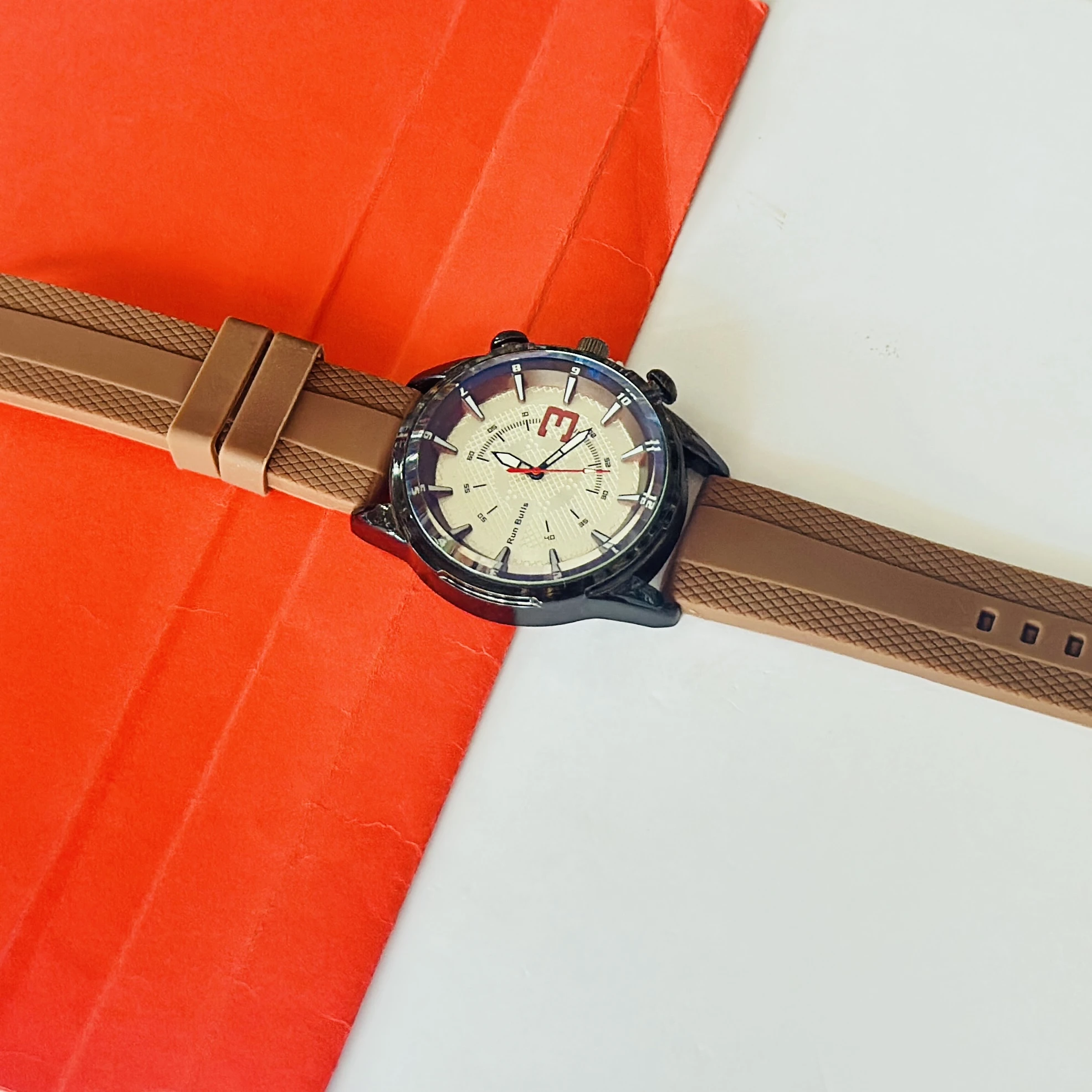 watch appears to be a Run Bulls branded analog
