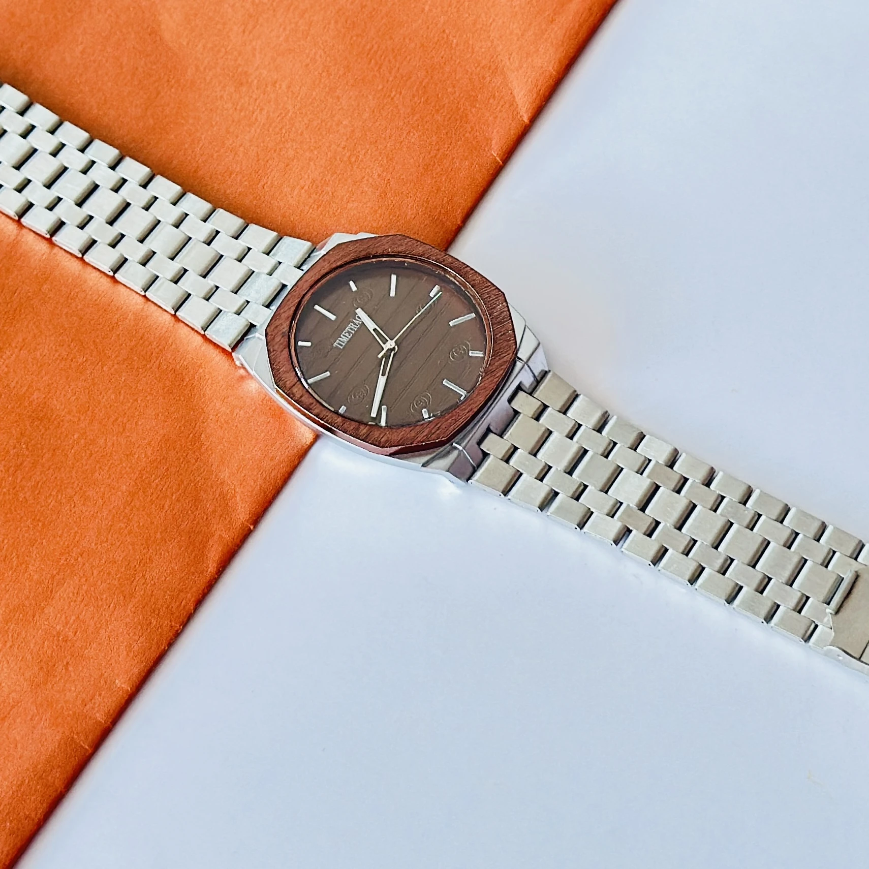 silver-toned stainless steel analogue watch
