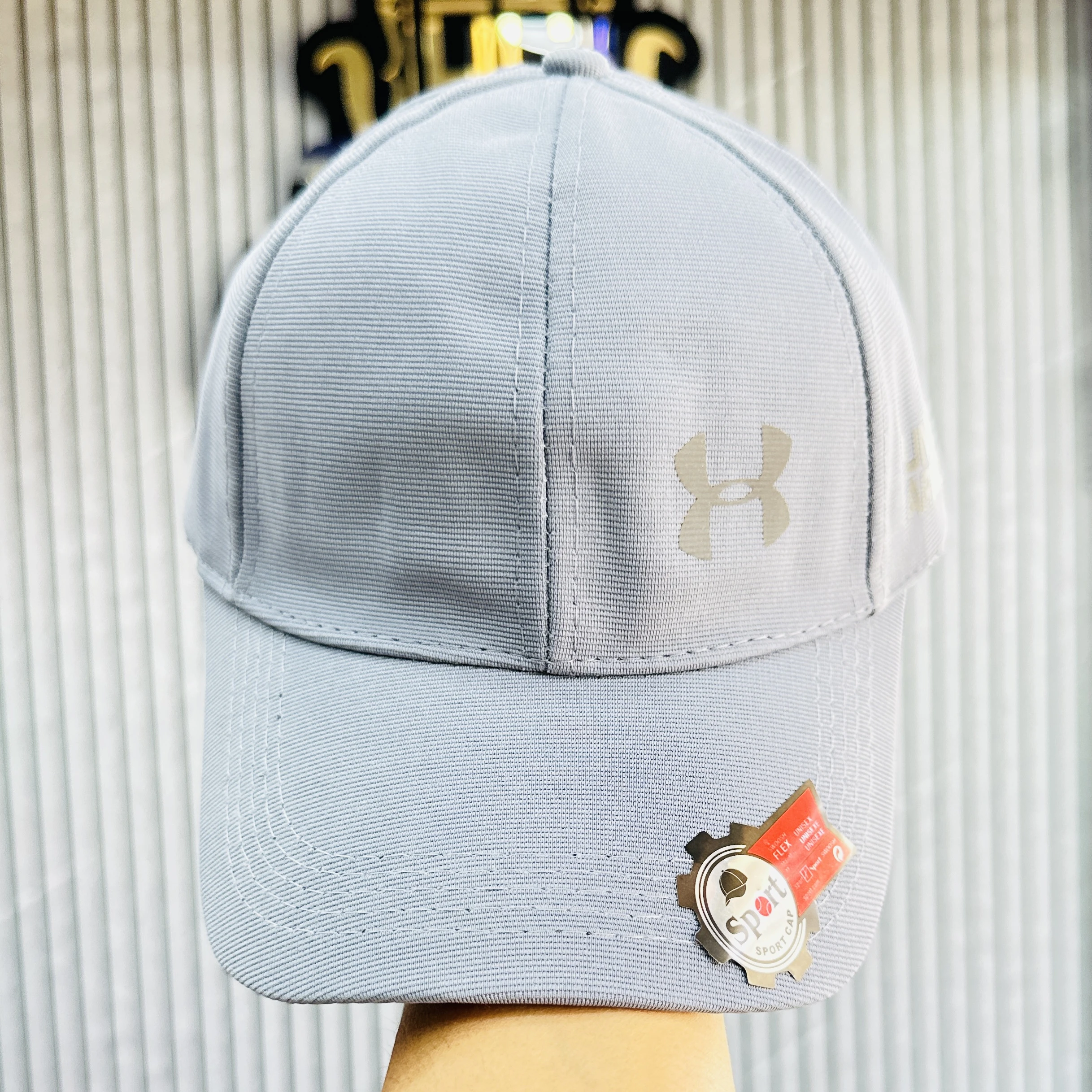Under Armour Men's ArmourVent Adjustable Hat in a light gray color.