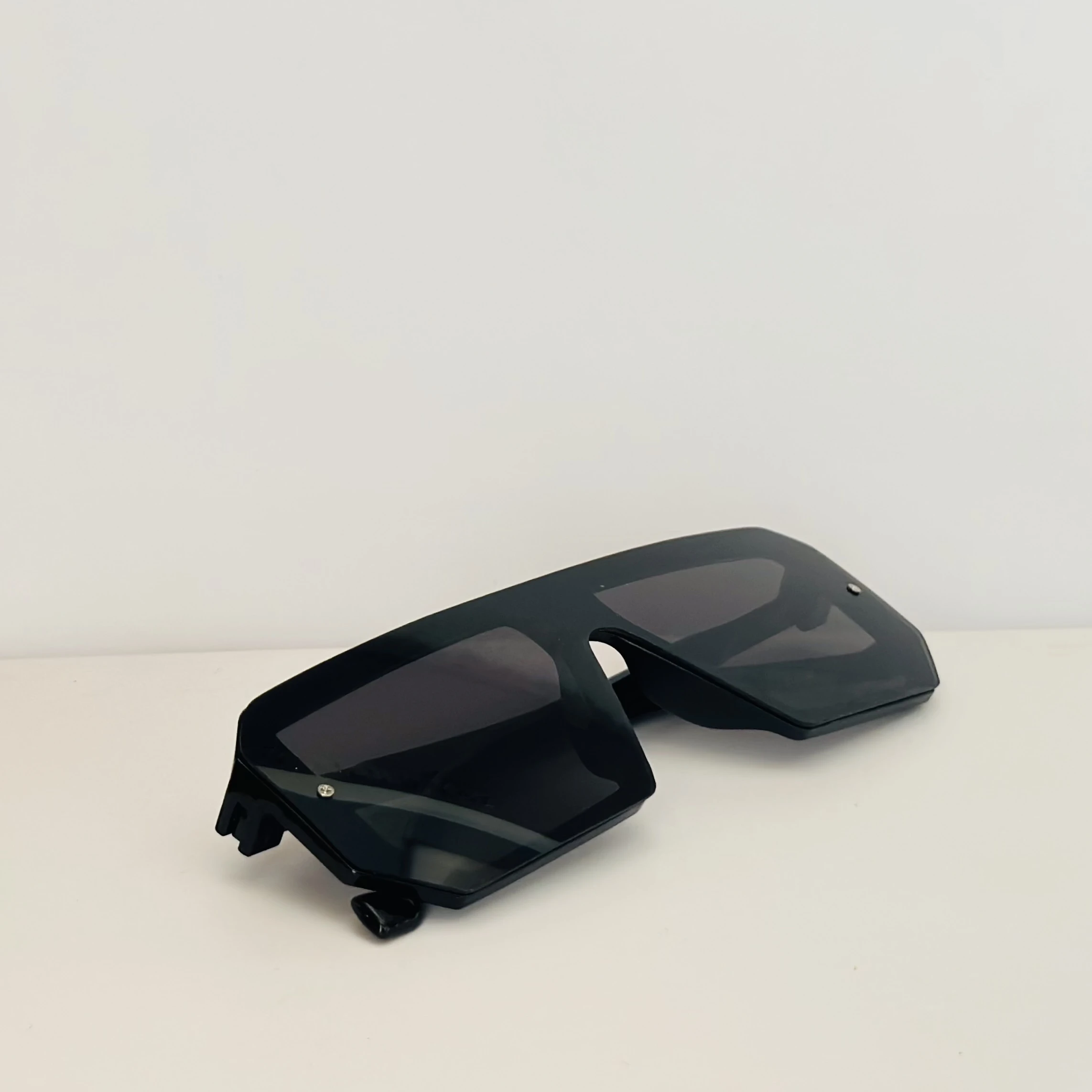 black oversized square flat top sunglasses with a visor design.