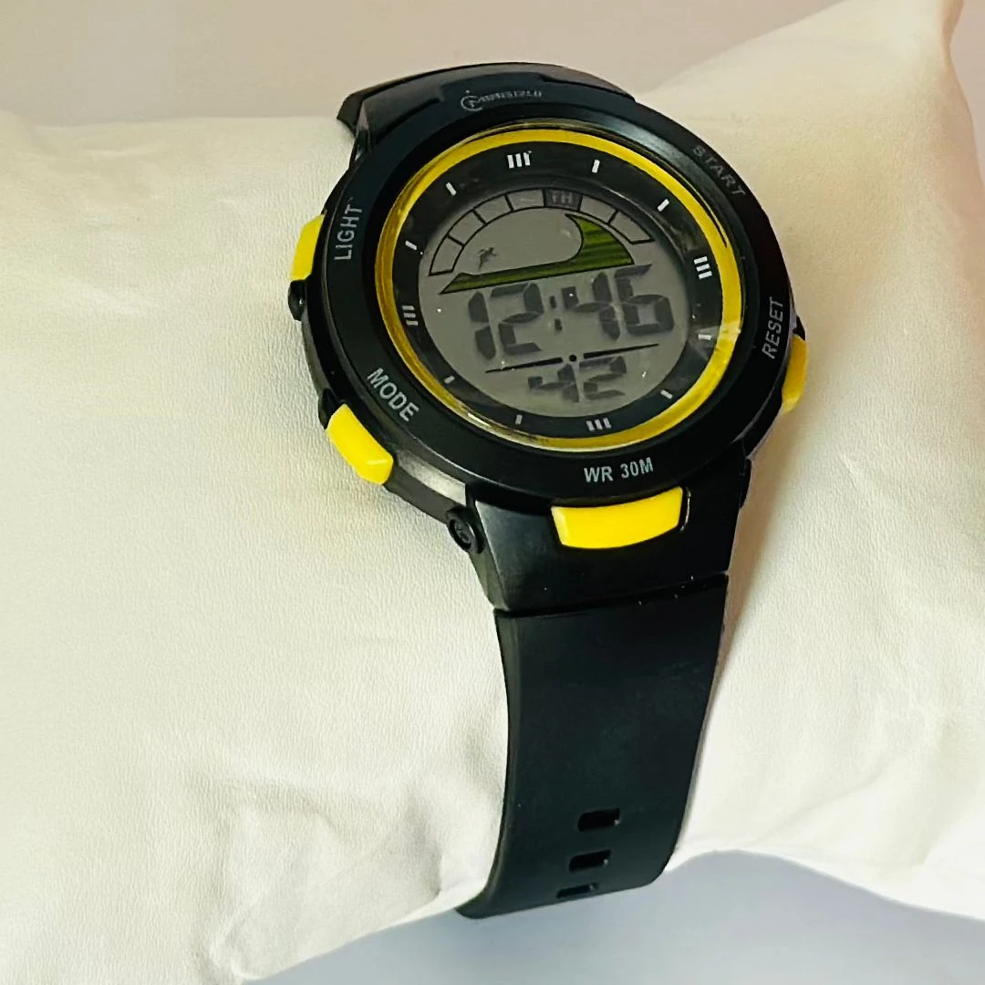 black Mingrui digital sports watch with a plastic or rubber strap.