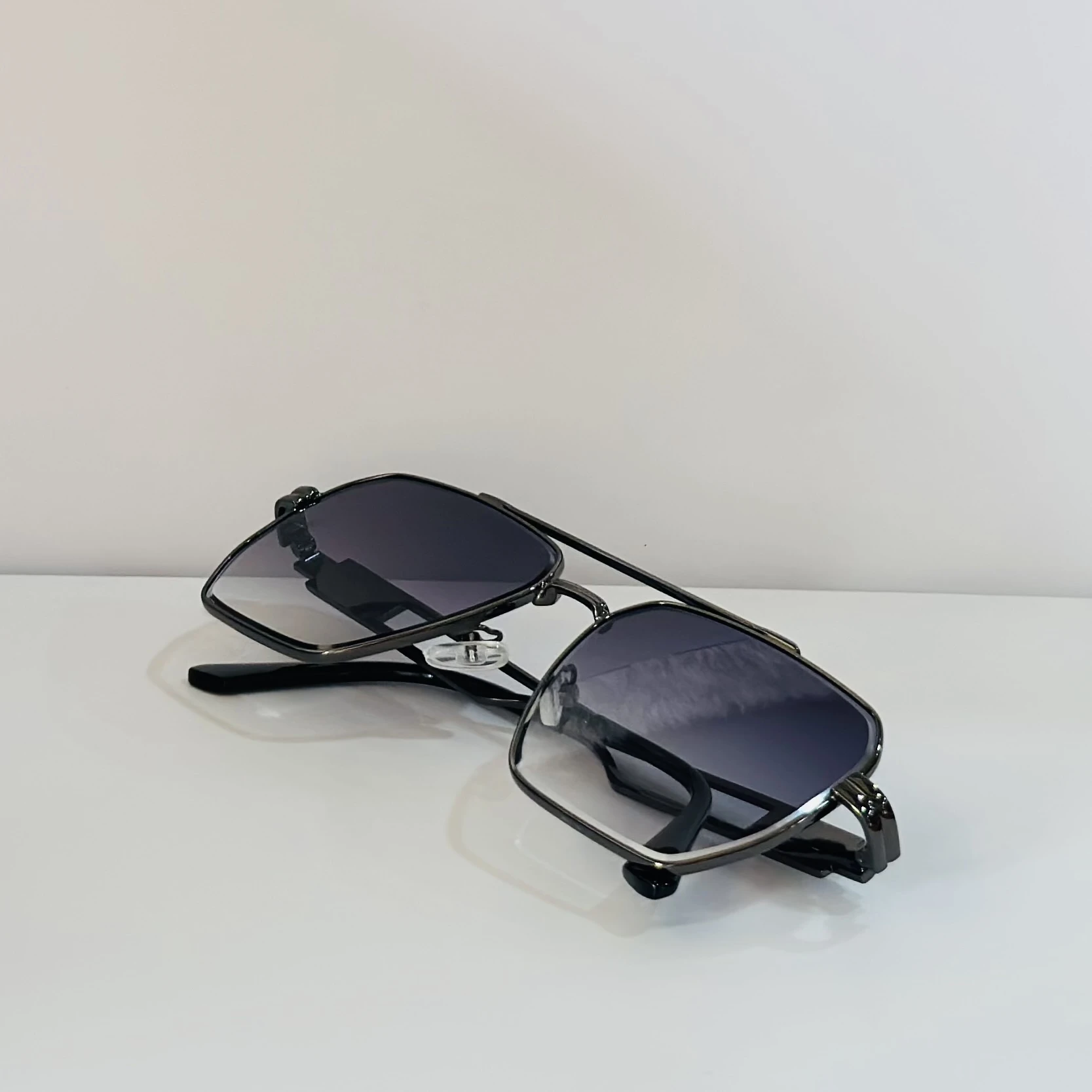pair of Voyage unisex grey frame purple lens color wayfarer sunglasses.