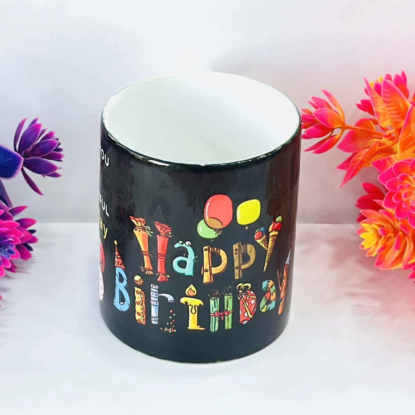 ceramic coffee mug with a "Happy Birthday" print. ….S7EG1P