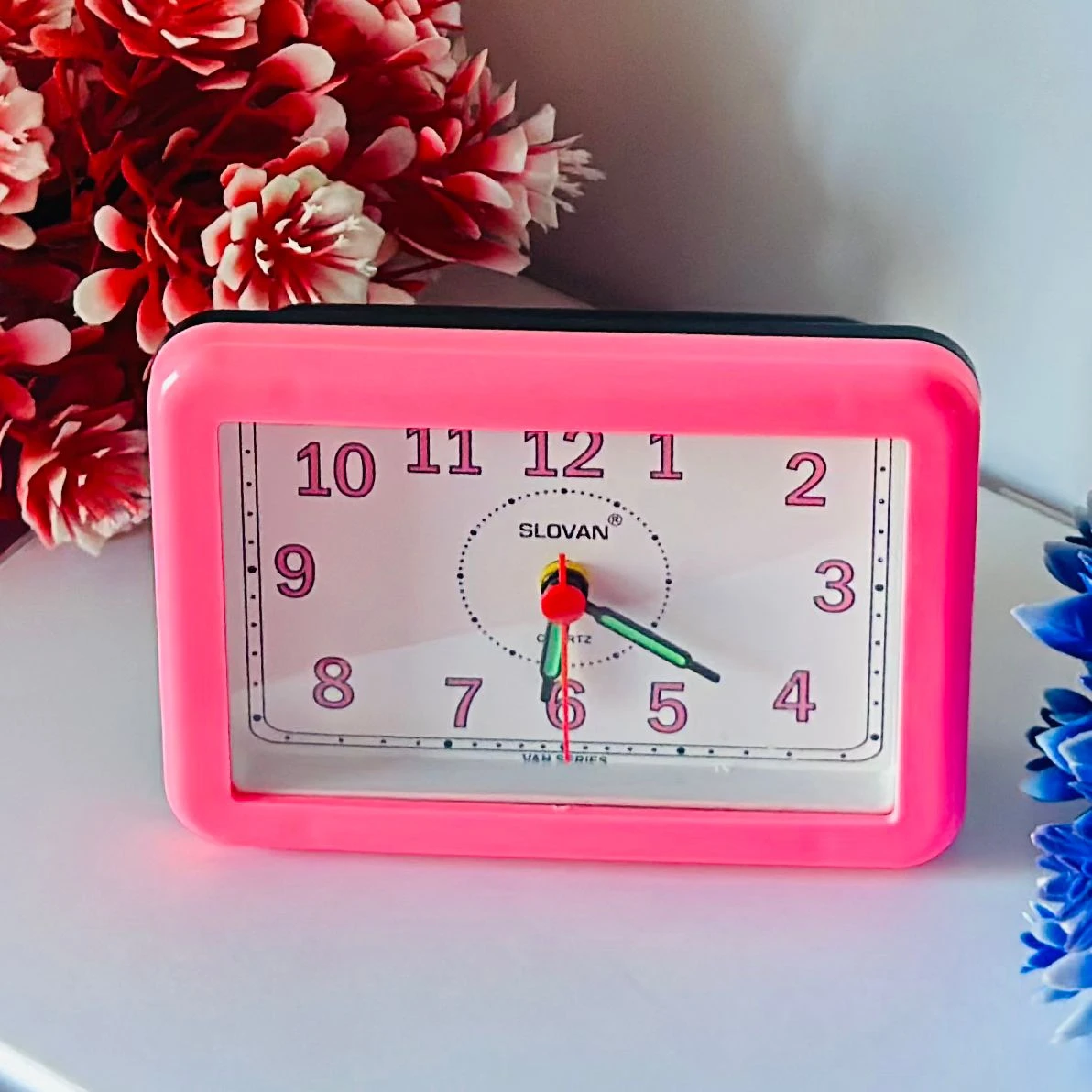 Alarm watch with pink color