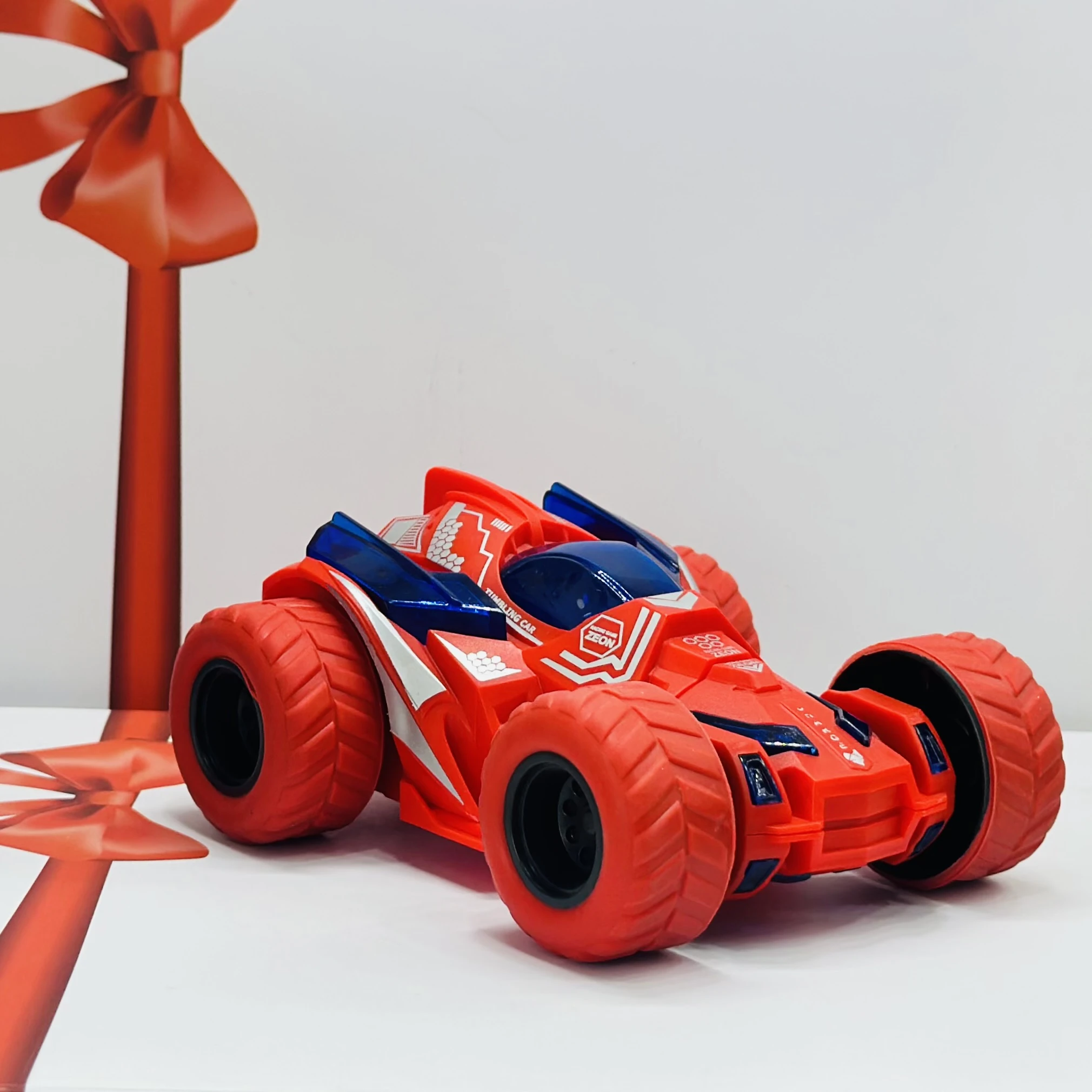 friction-powered toy stunt car