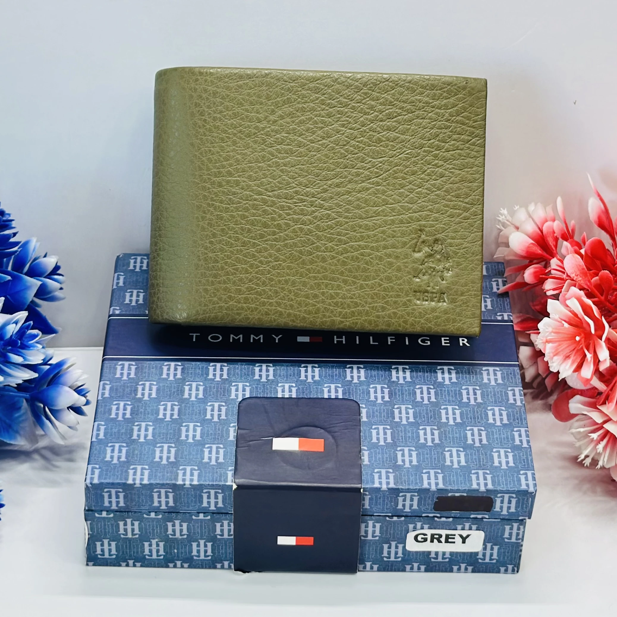 U.S. Polo Assn. bi-fold solid wallet in an olive color.