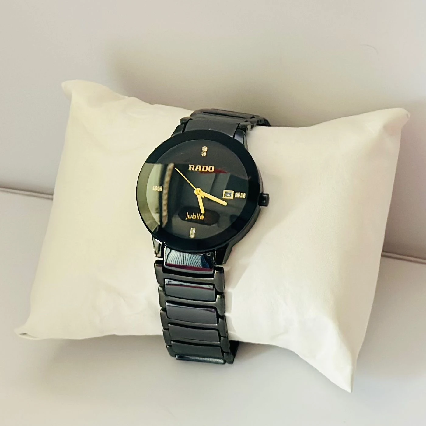 Rado Integral black ceramic and yellow gold-tone watch.