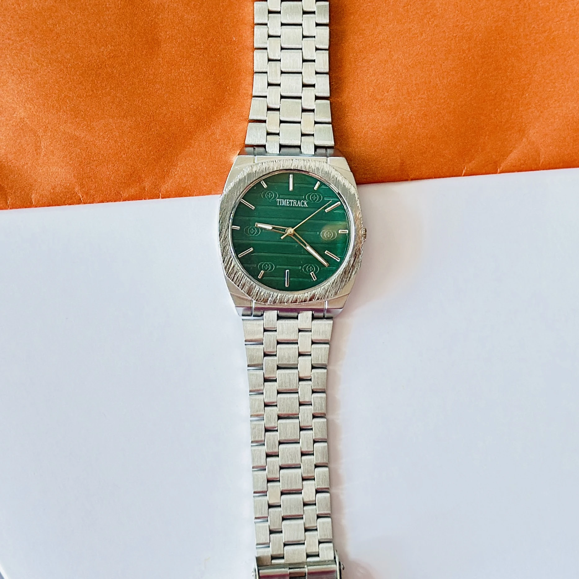 silver-toned stainless steel analogue watch