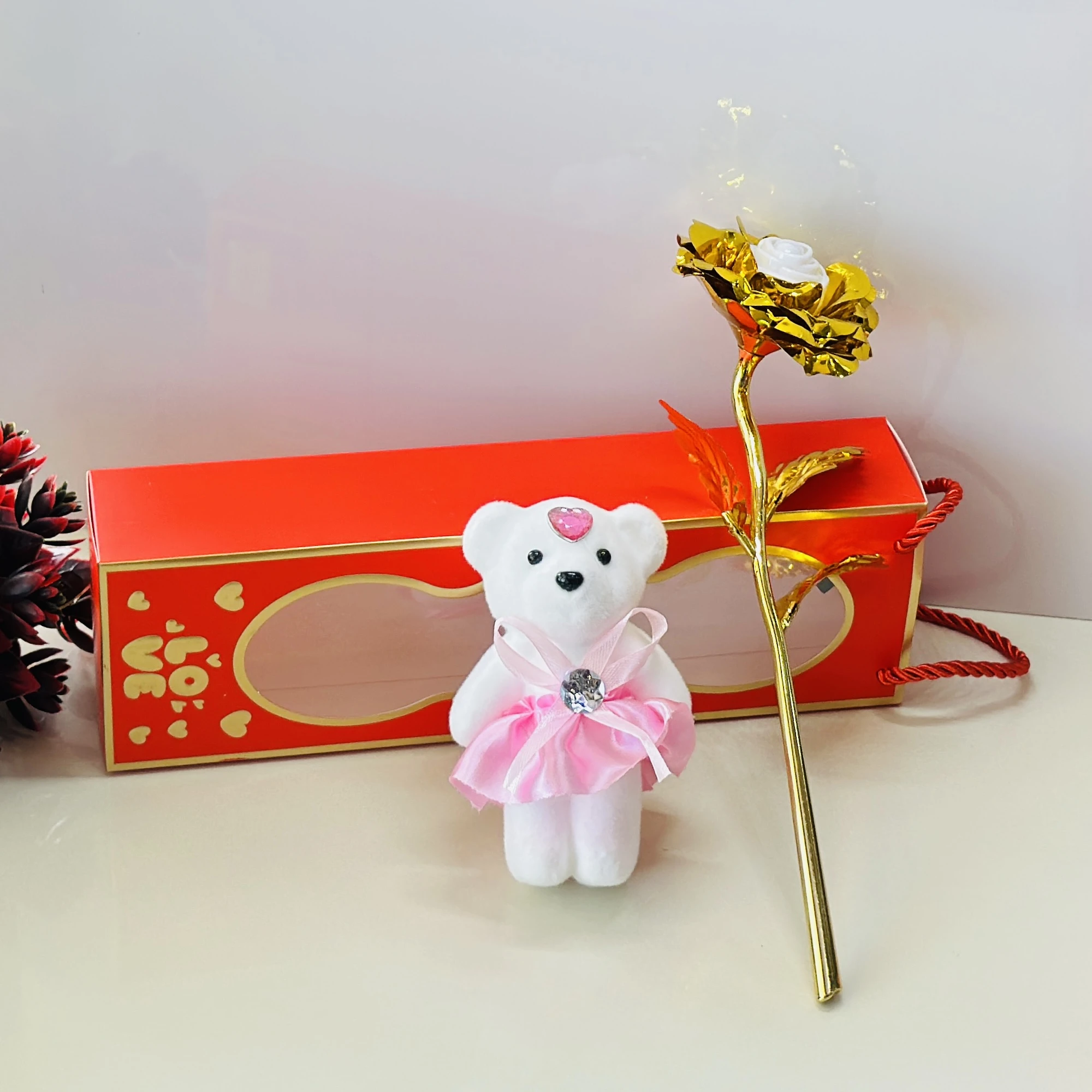 Golden rose and a small teddy bear gift set