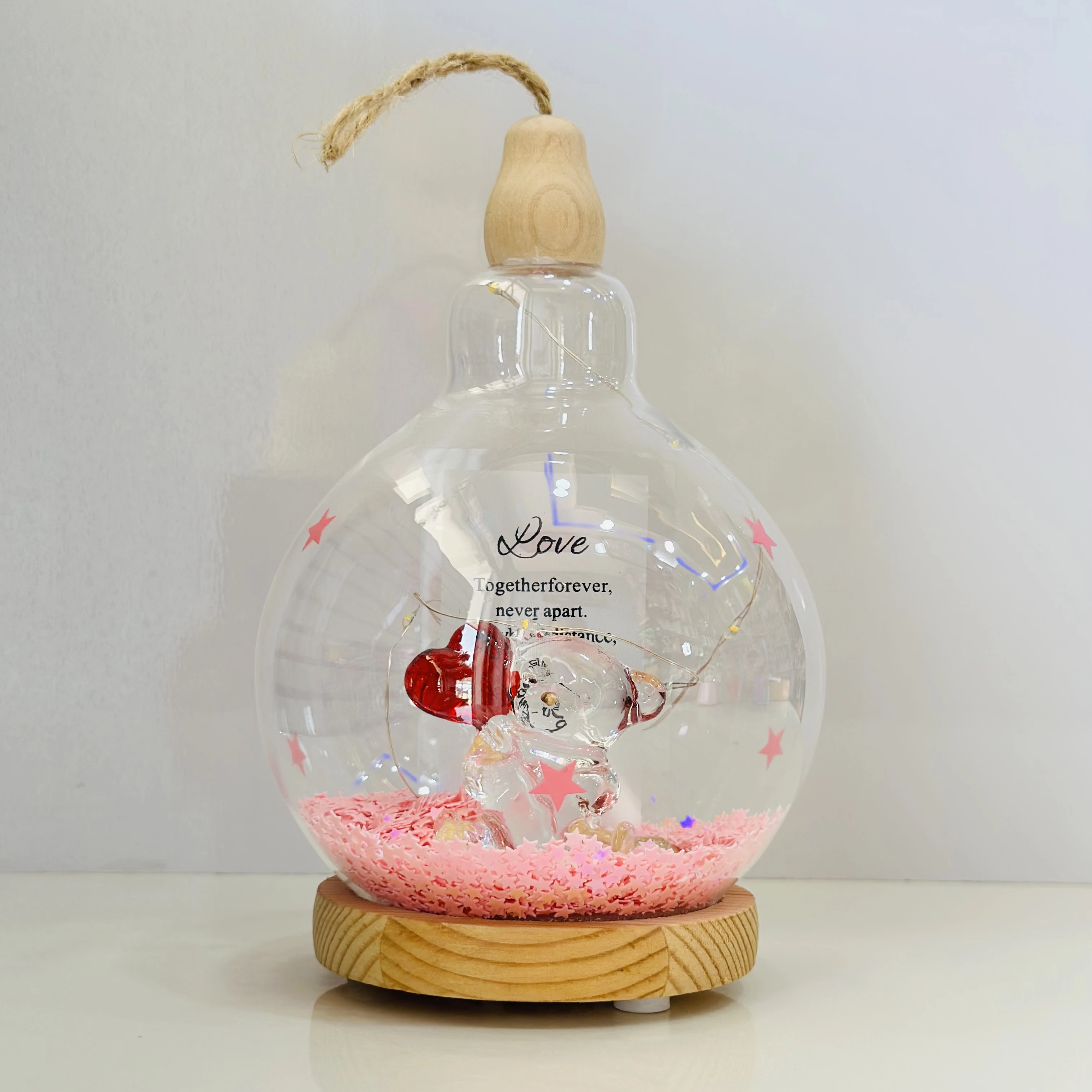 decorative glass dome with LED lights, featuring a couple figurine inside.(SKU-5NELVH)
