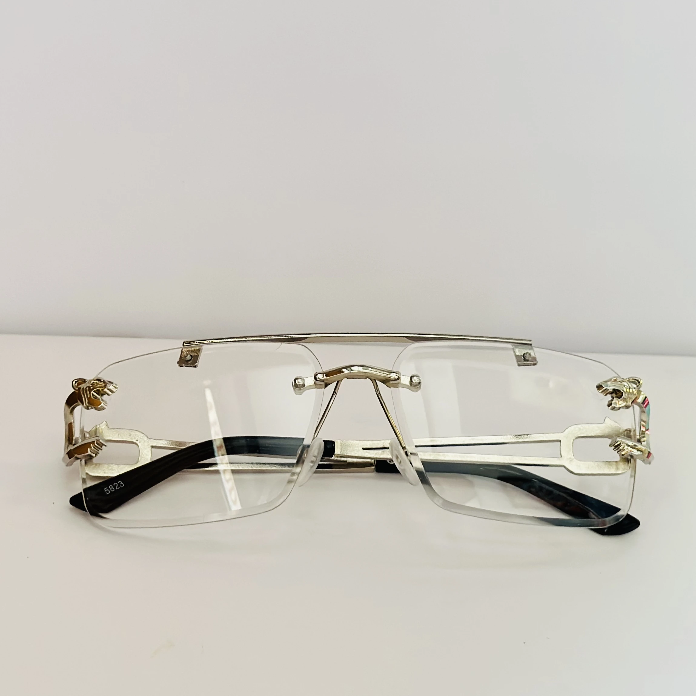 RioRabbit Mobster silver-frame rimless square eyeglasses with blue light blocking technology.