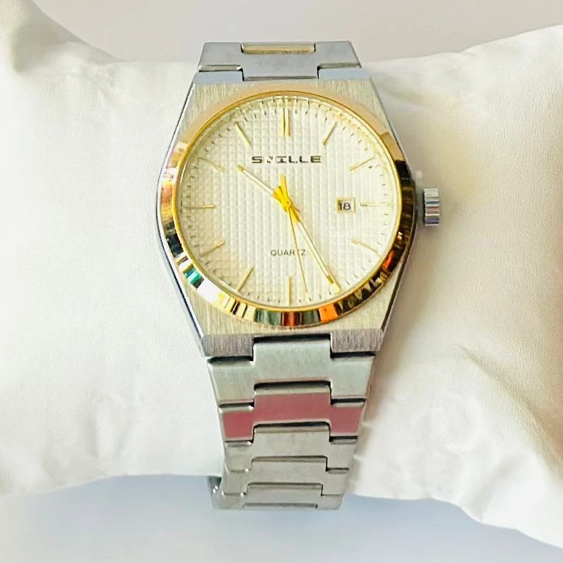 SNILLE PRX Watch  (silver and gold)  strap.