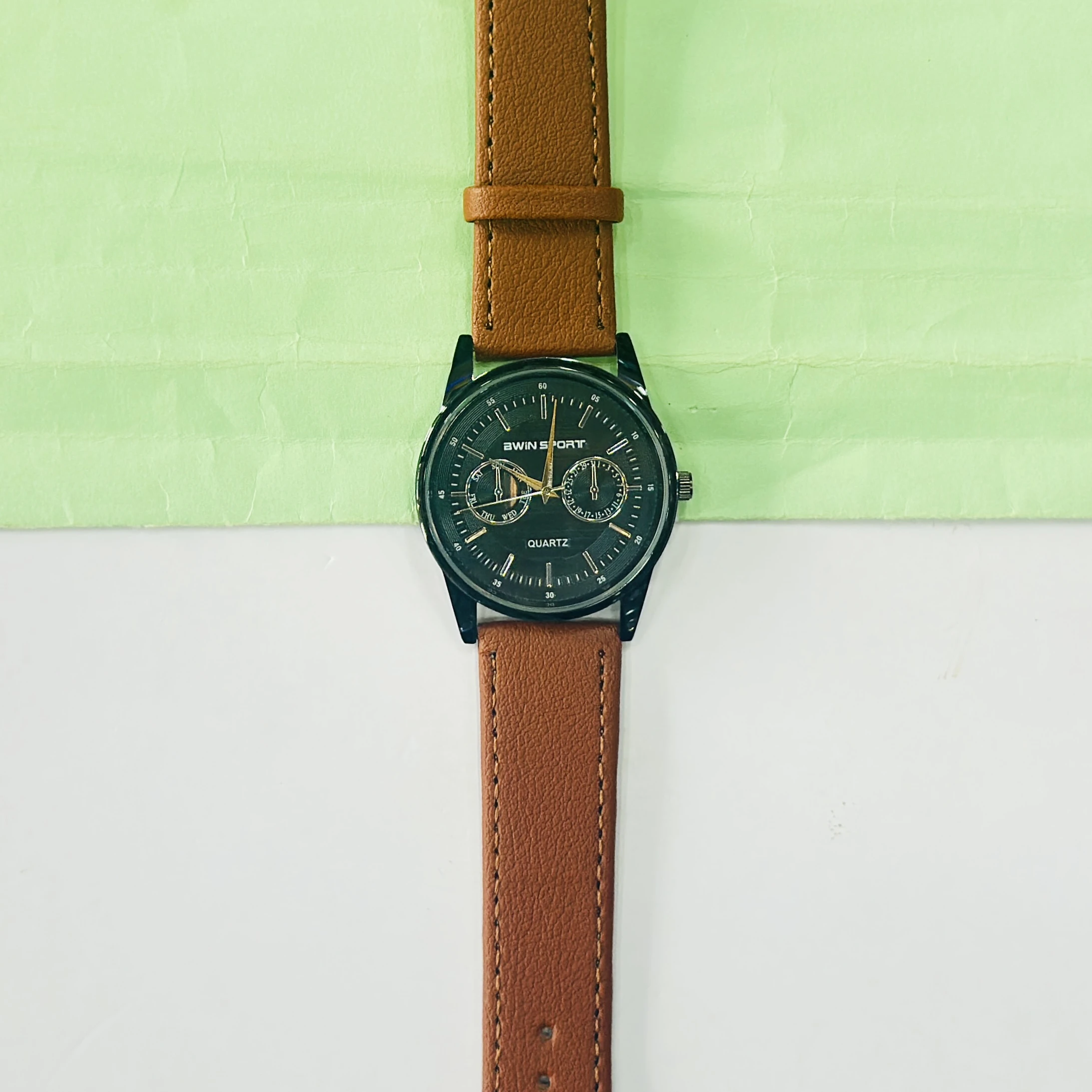 appears to be an AWIN SPORT quartz watch