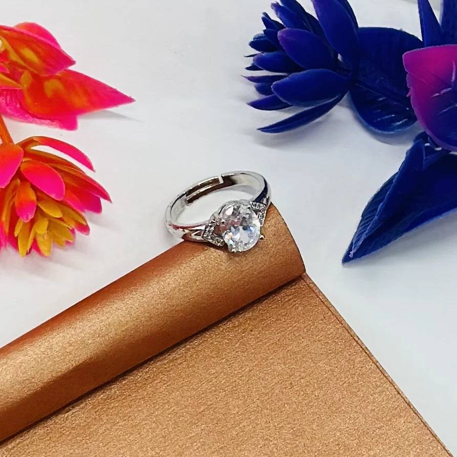 sterling silver or white gold diamond or moissanite engagement ring