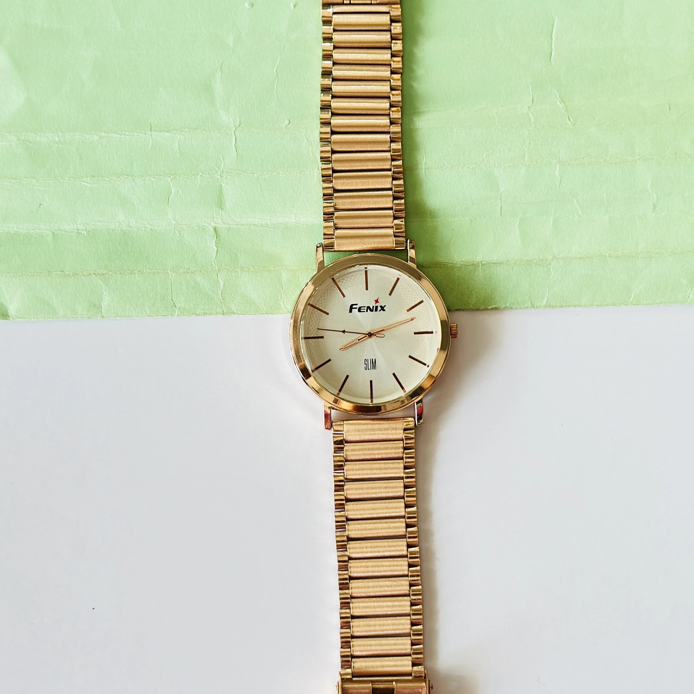 Rose Gold analogue watch