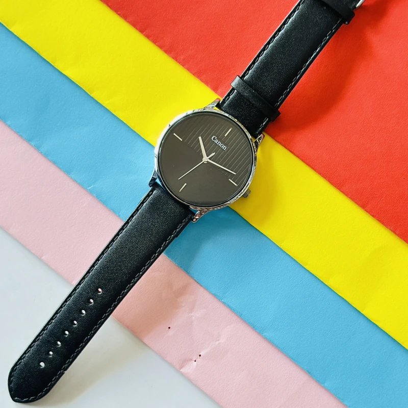 Quartz analogue watch for gents