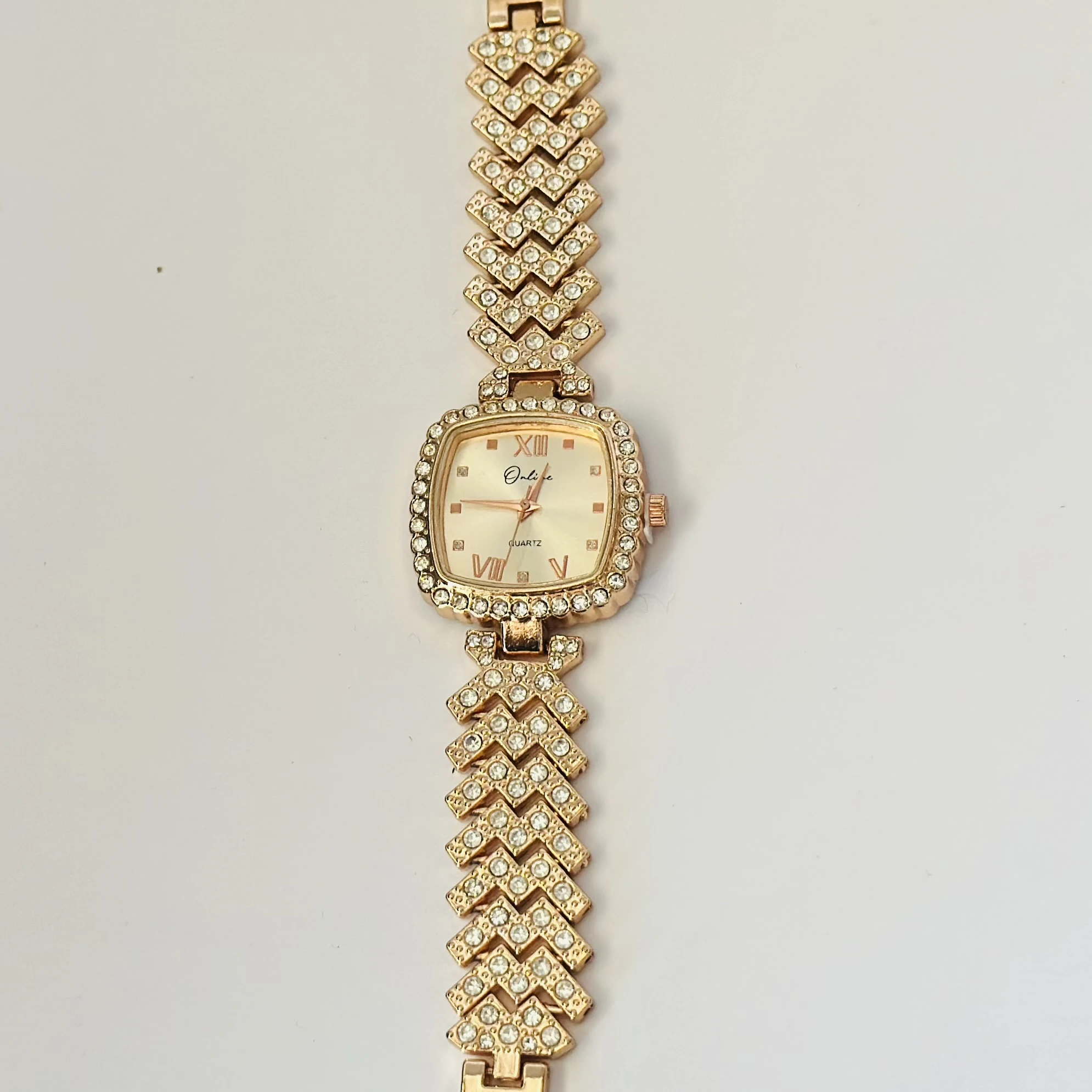 Rose gold analog watch