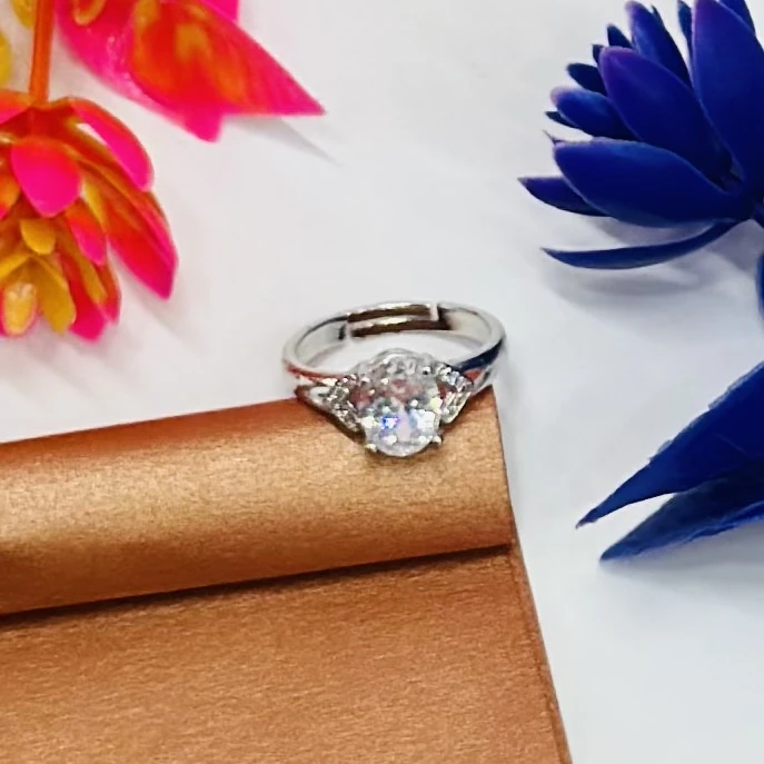 sterling silver or white gold diamond or moissanite engagement ring