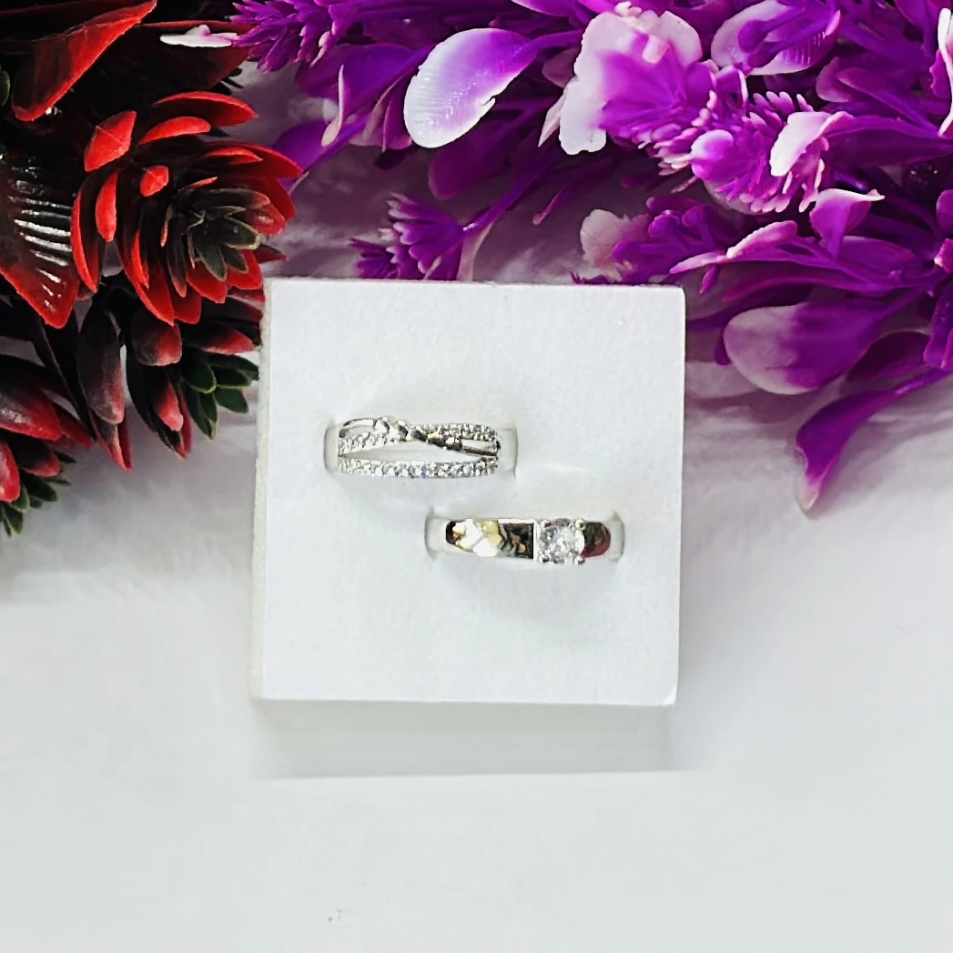 Set of silver-toned couple rings