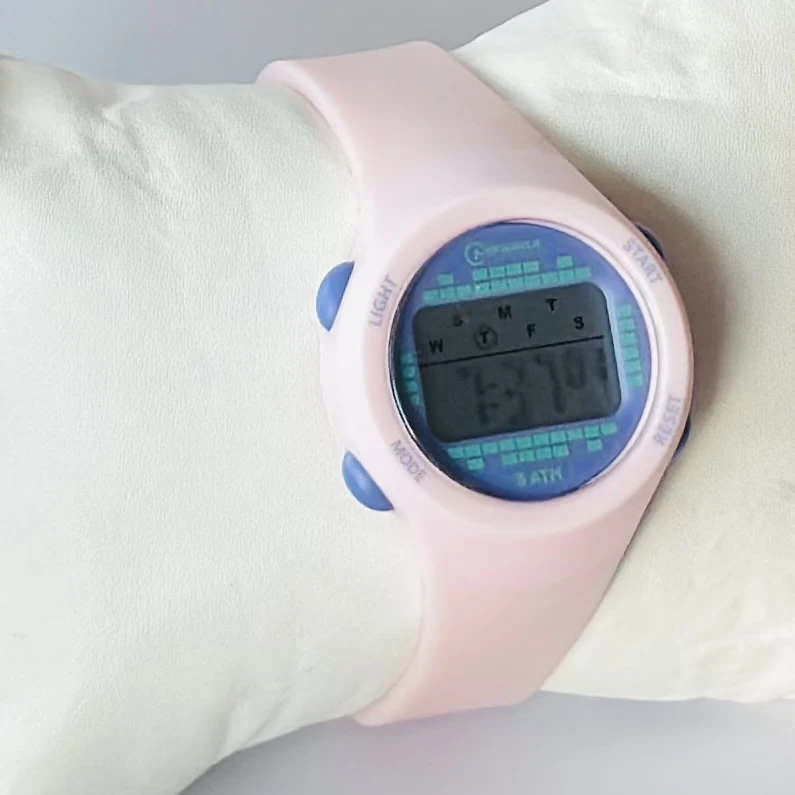 Mingrui 8212L Tennger Lady sport digital watch with a pink silicone strap.