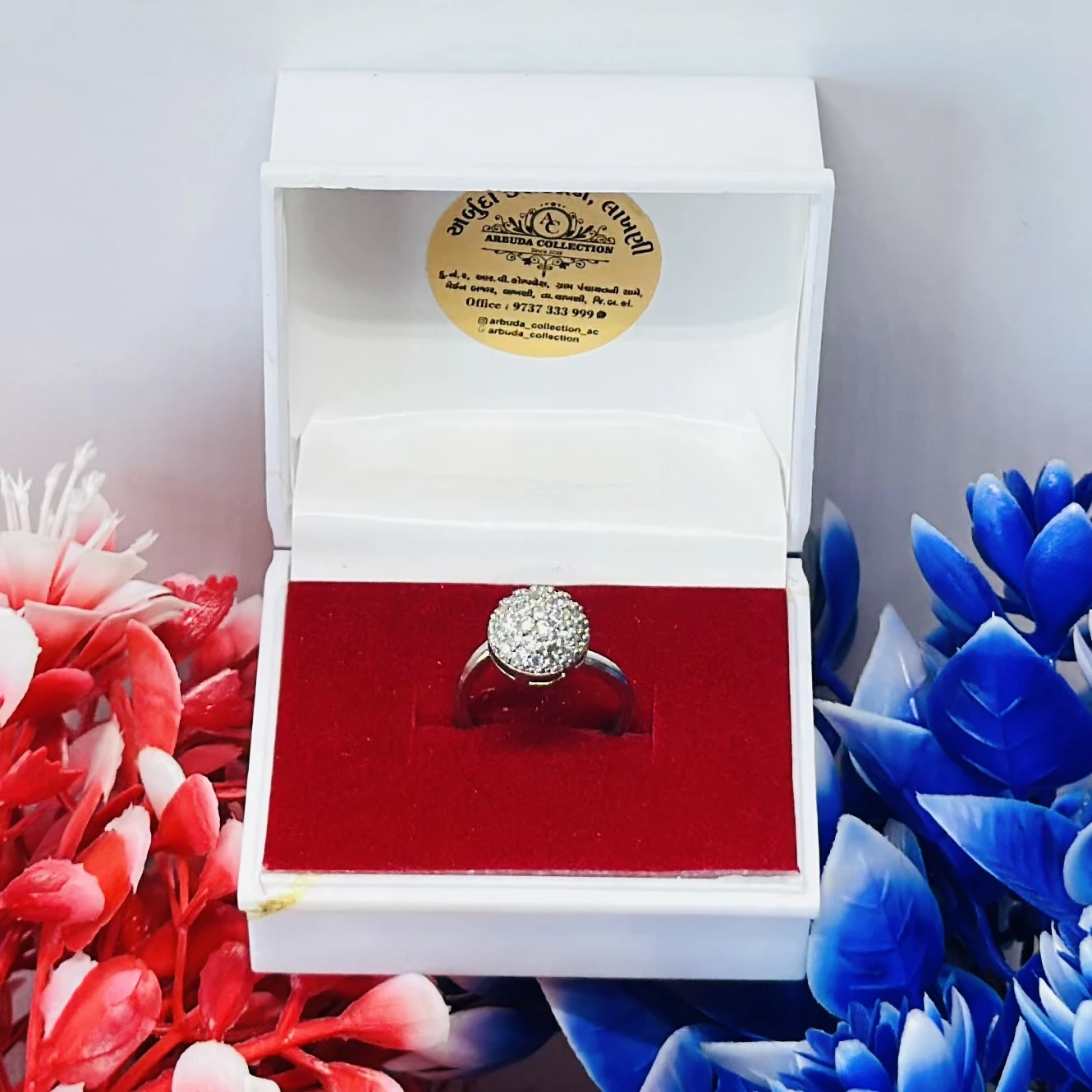 Abdesigns silver-plated American diamond cocktail ring.