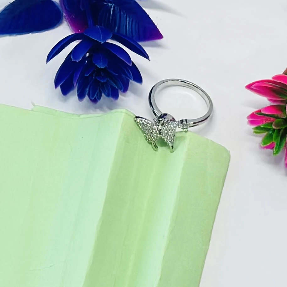 An adjustable silver-plated butterfly ring