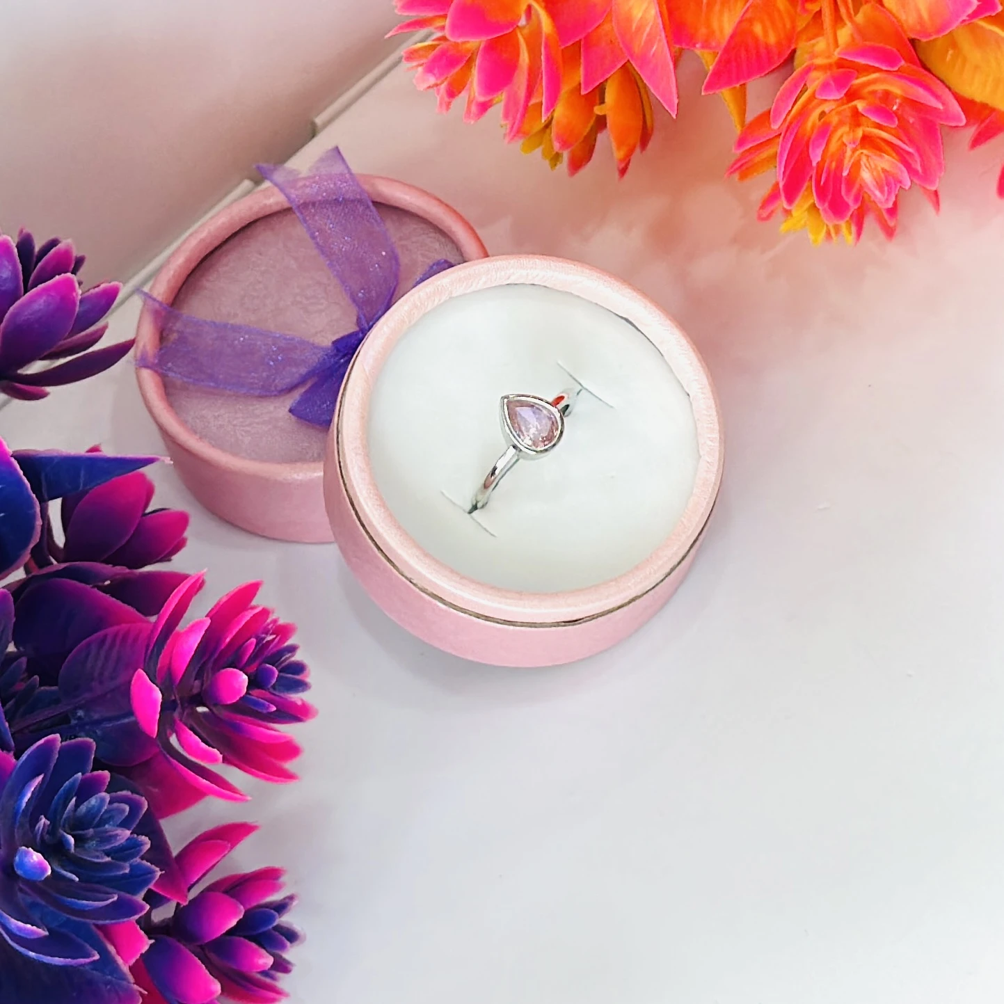 pear-cut pink cubic zirconia or pink sapphire ring