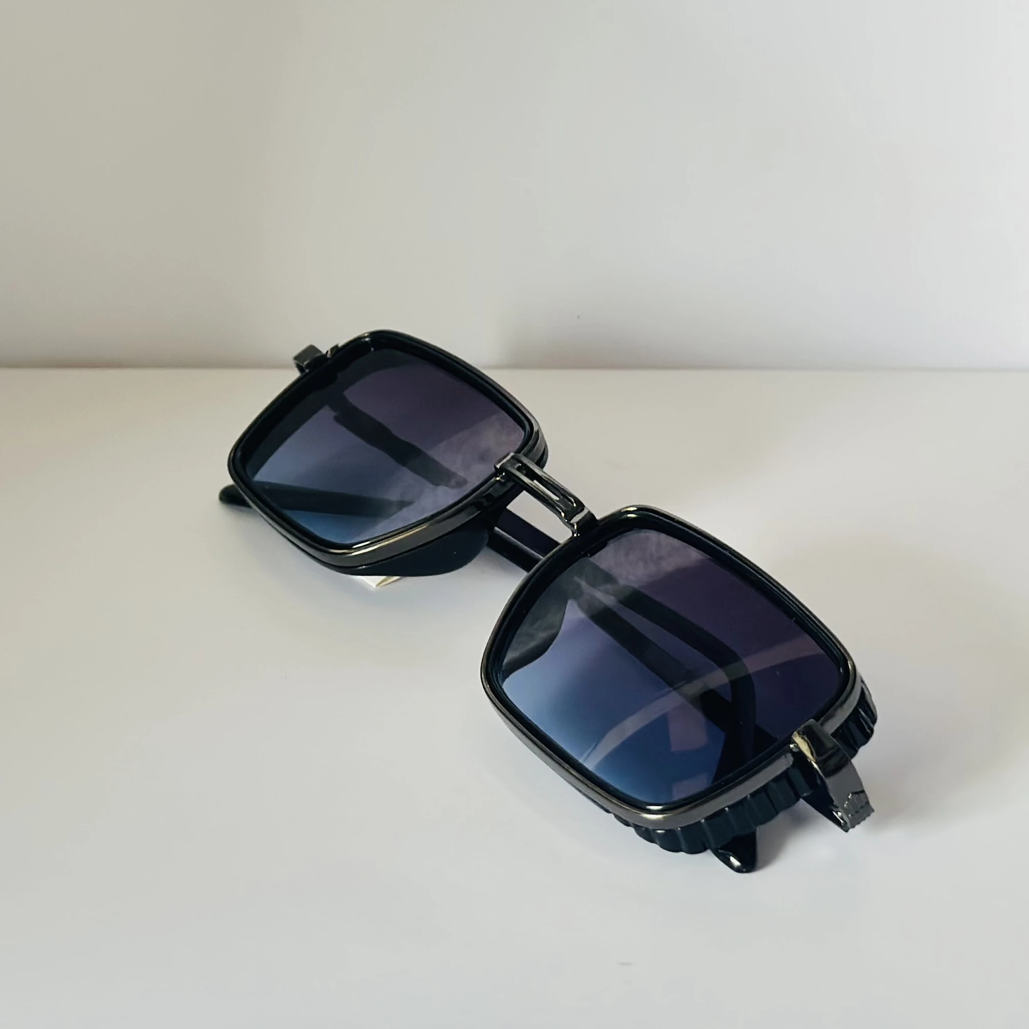pair of Aedoll Goggle sunglasses with a gold metal frame and pink gradient lenses.