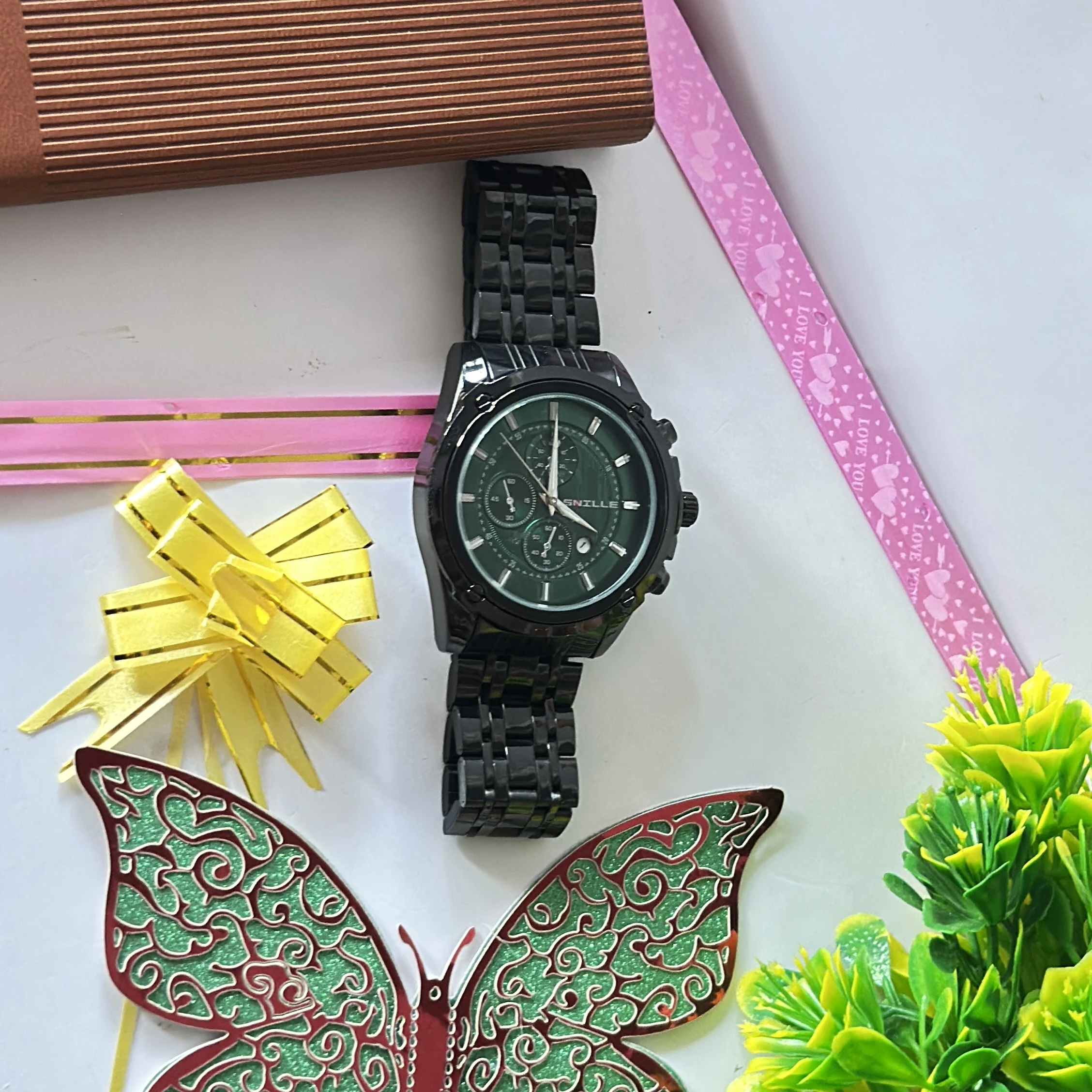 Black analog wristwatch with a metallic strap