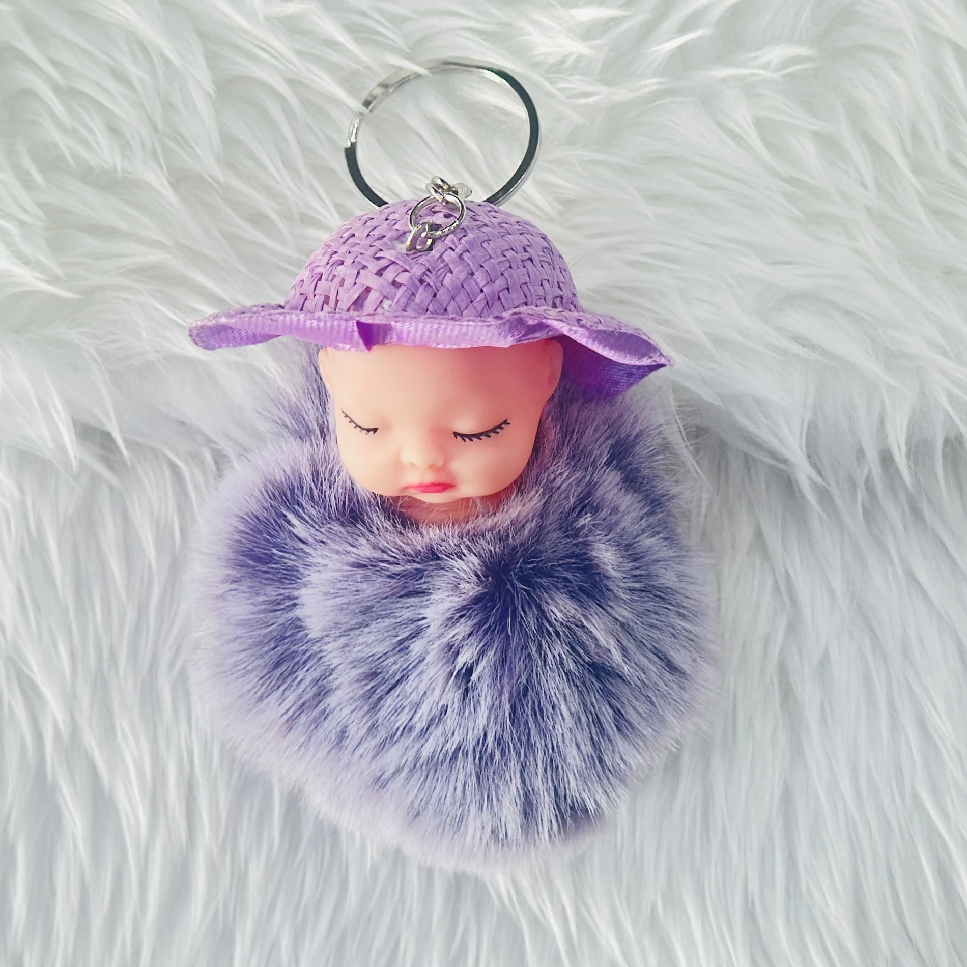 sleeping baby doll fluffy pom pom keychain