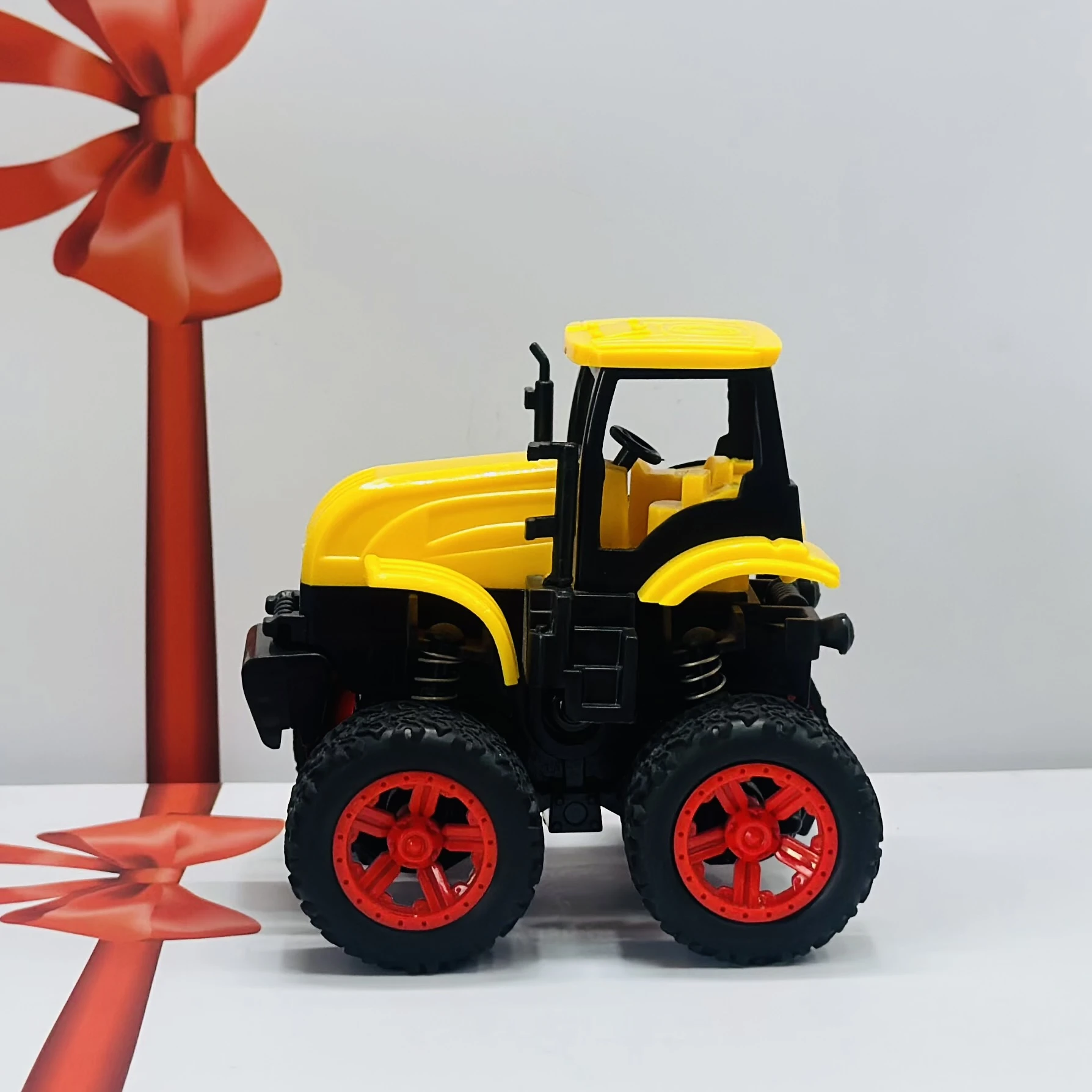 Yellow toy tractor