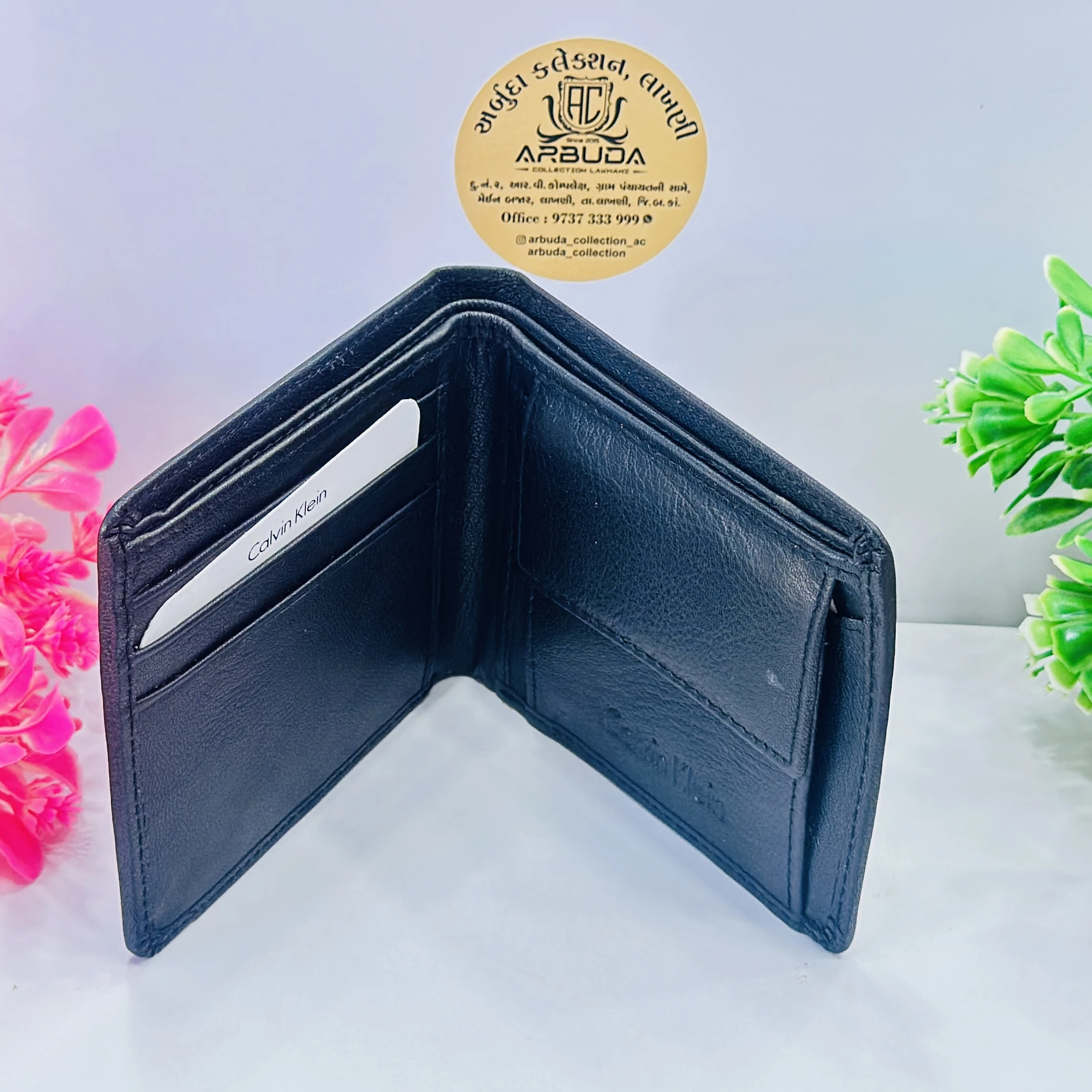 Calvin Klein Jeans Black Hardware Bifold Wallet.
