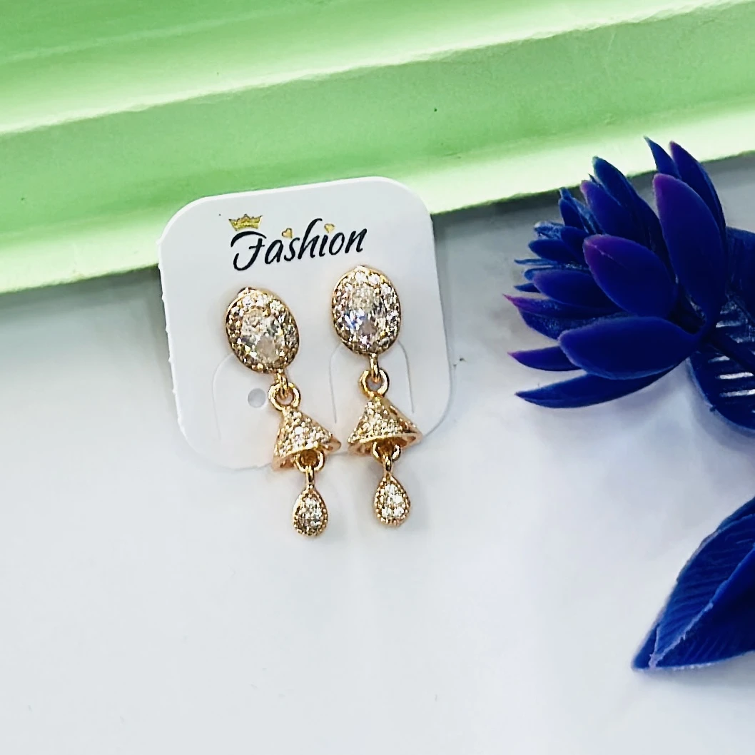 Gold toned jhumka earrings