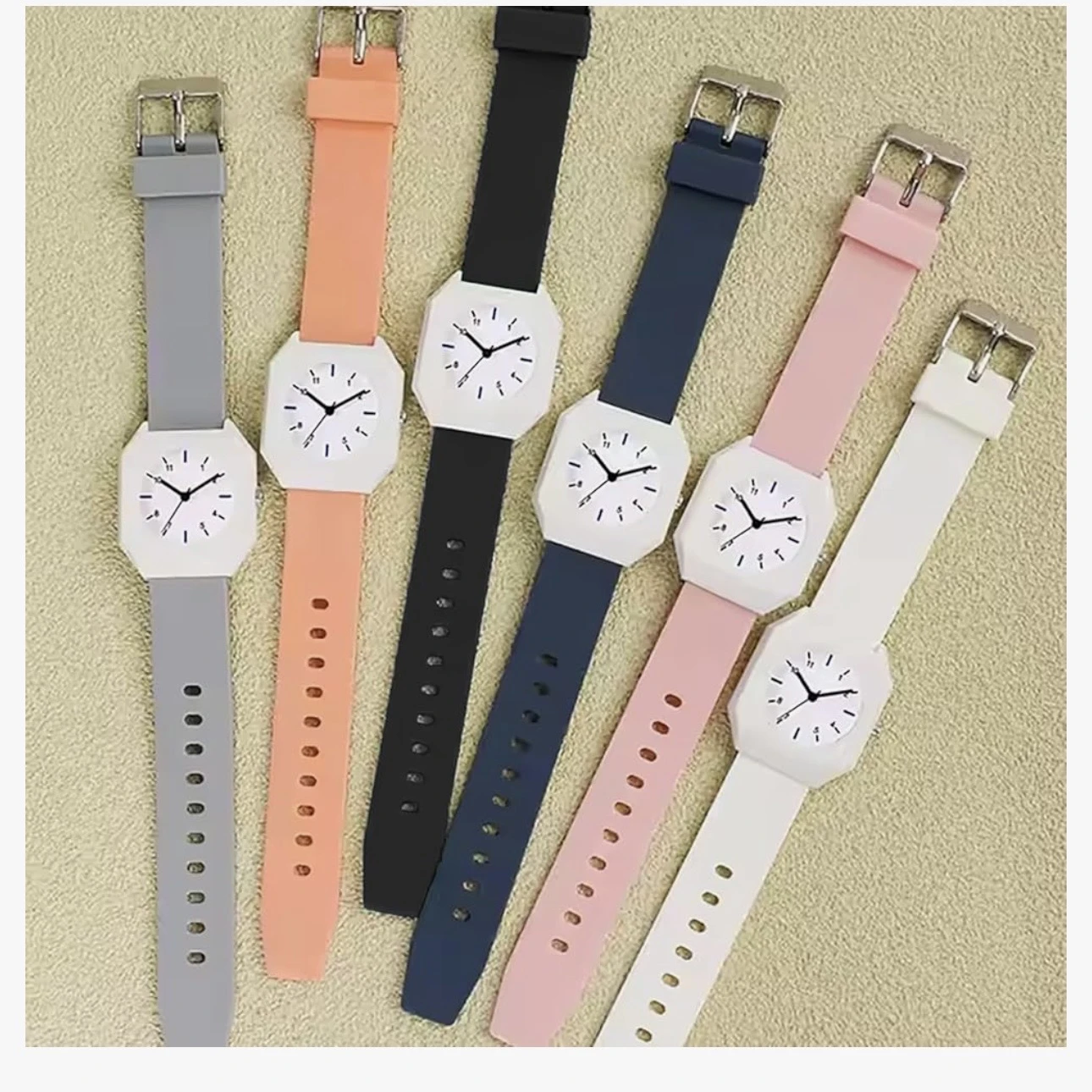 Mingrui analog quartz watch with a white plastic case and a peach/orange silicone strap