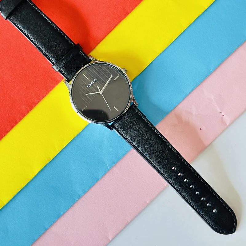 Quartz analogue watch for gents