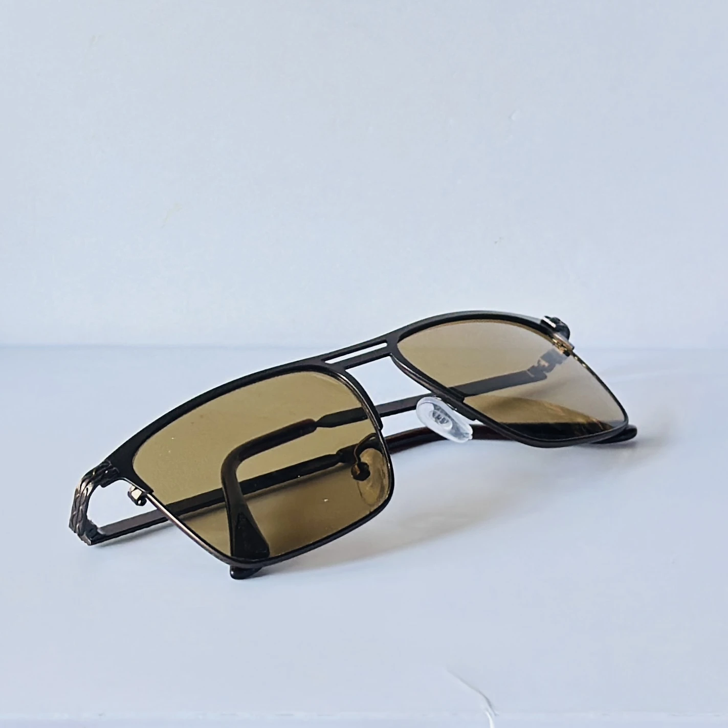 sunglasses appear to be the Vincent Chase