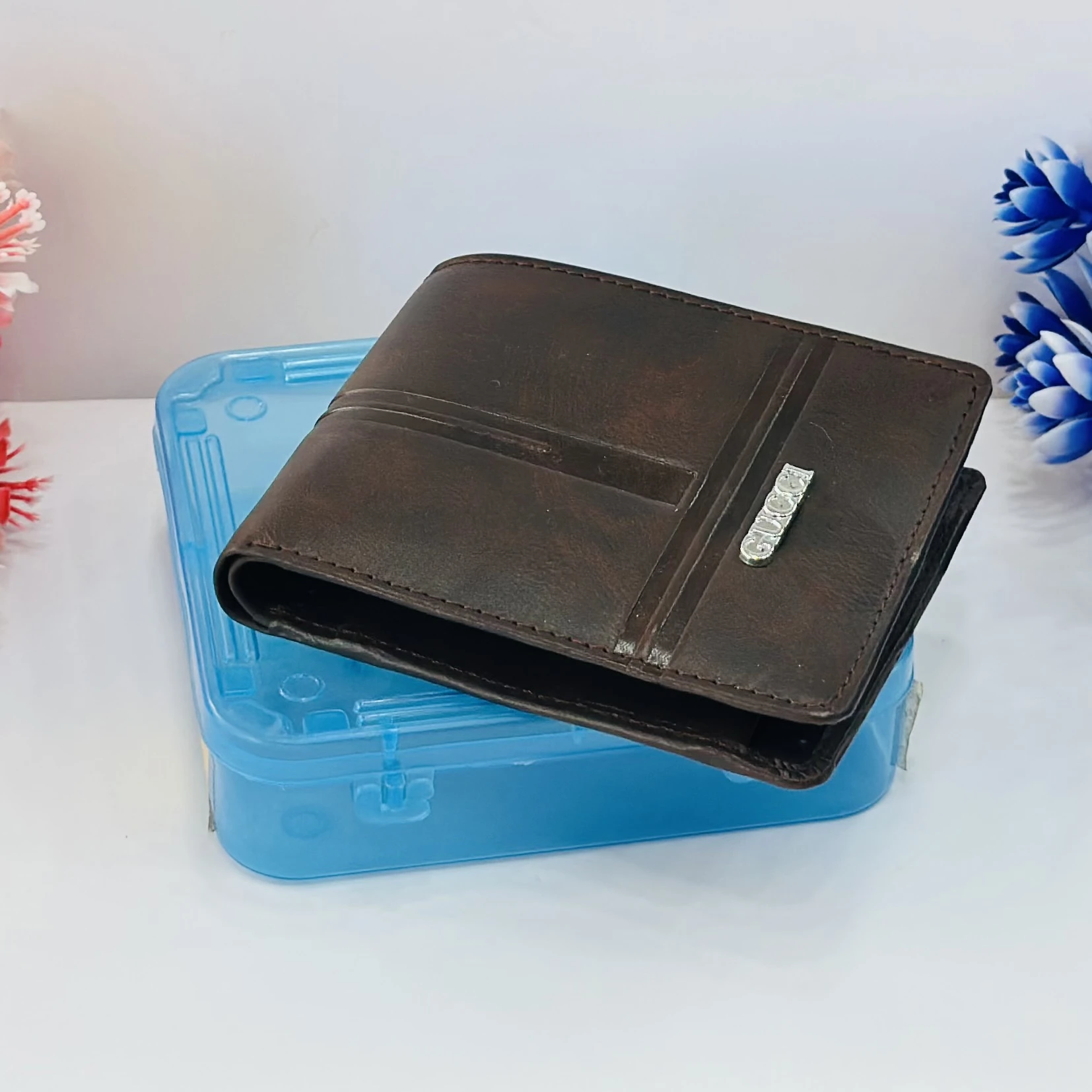 Alvis men's brown artificial leather bifold wallet.