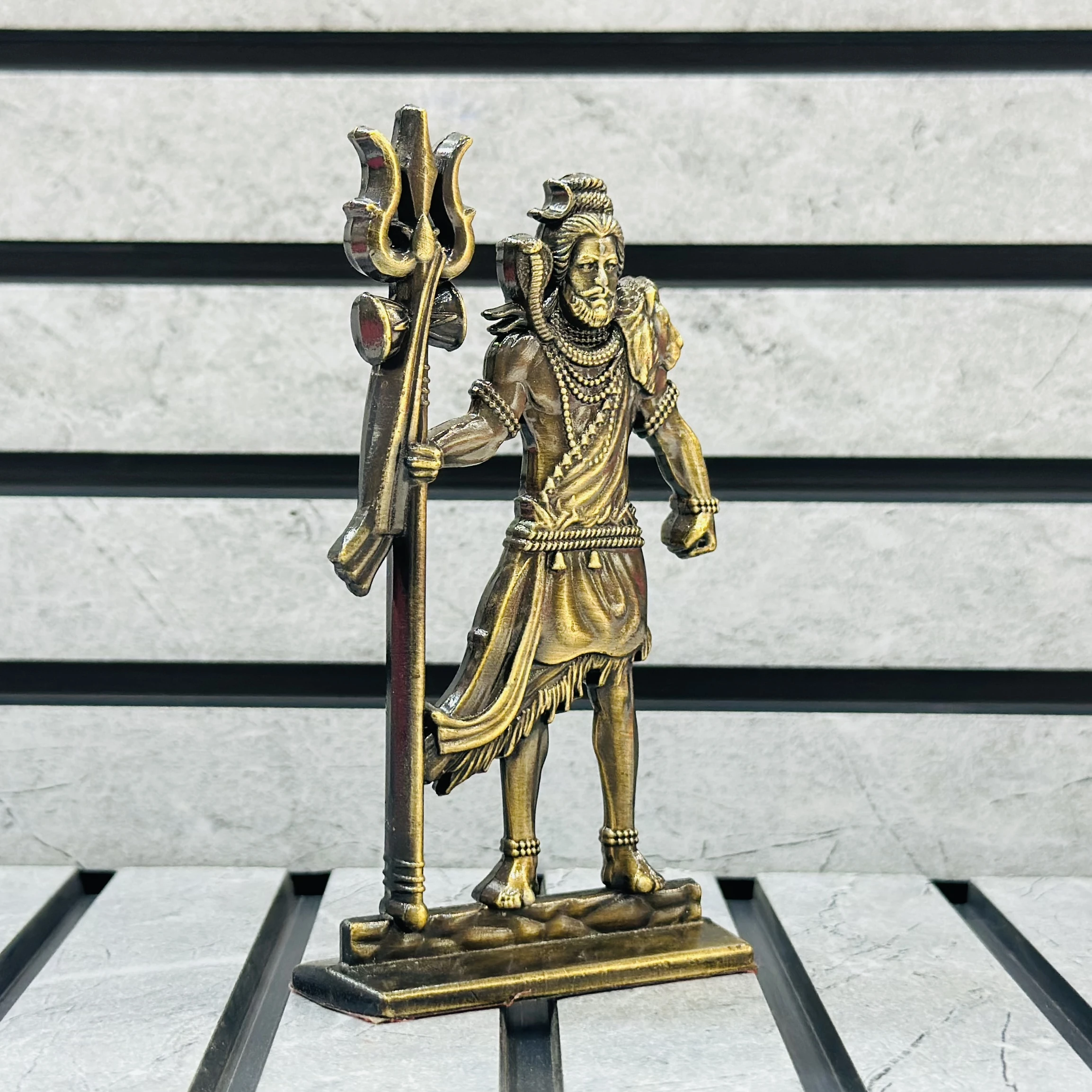 brass statue of the Hindu deity Lord Shiva.