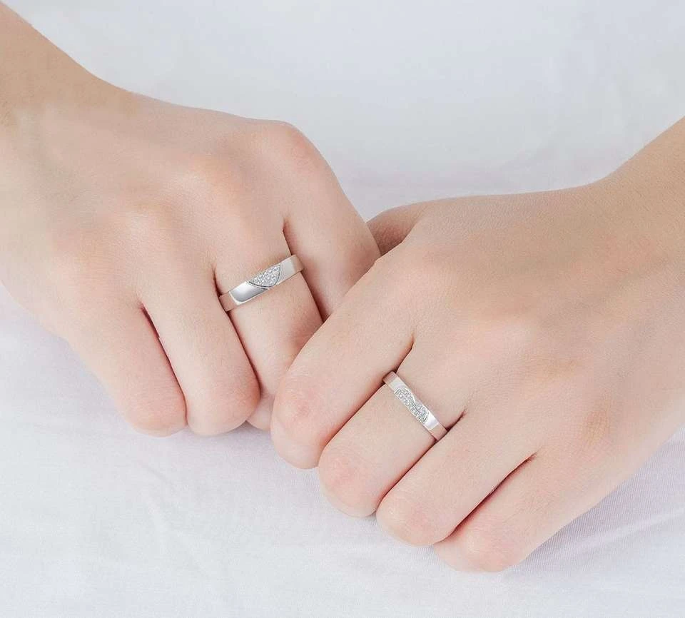 matching silver-tone couple rings