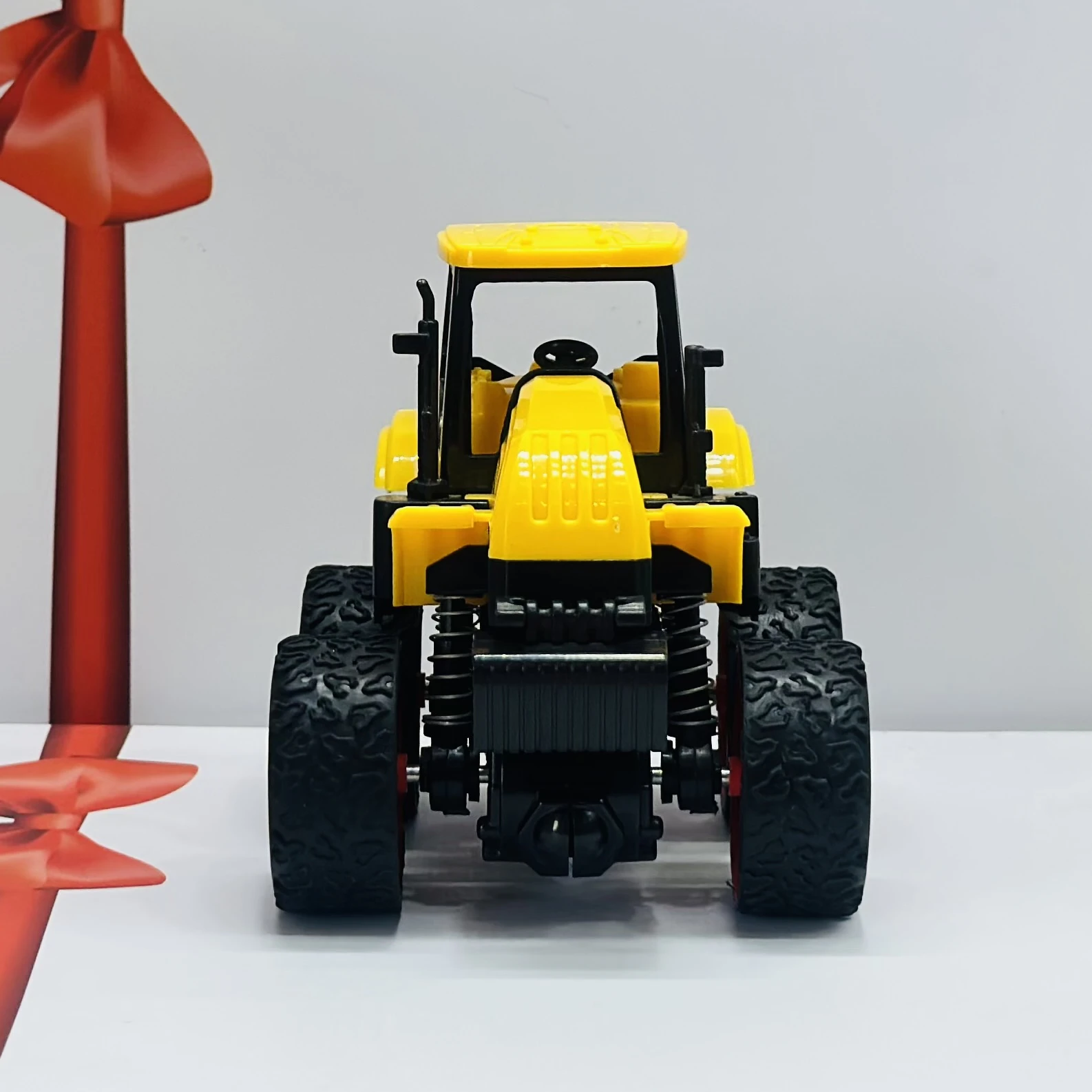 Yellow toy tractor