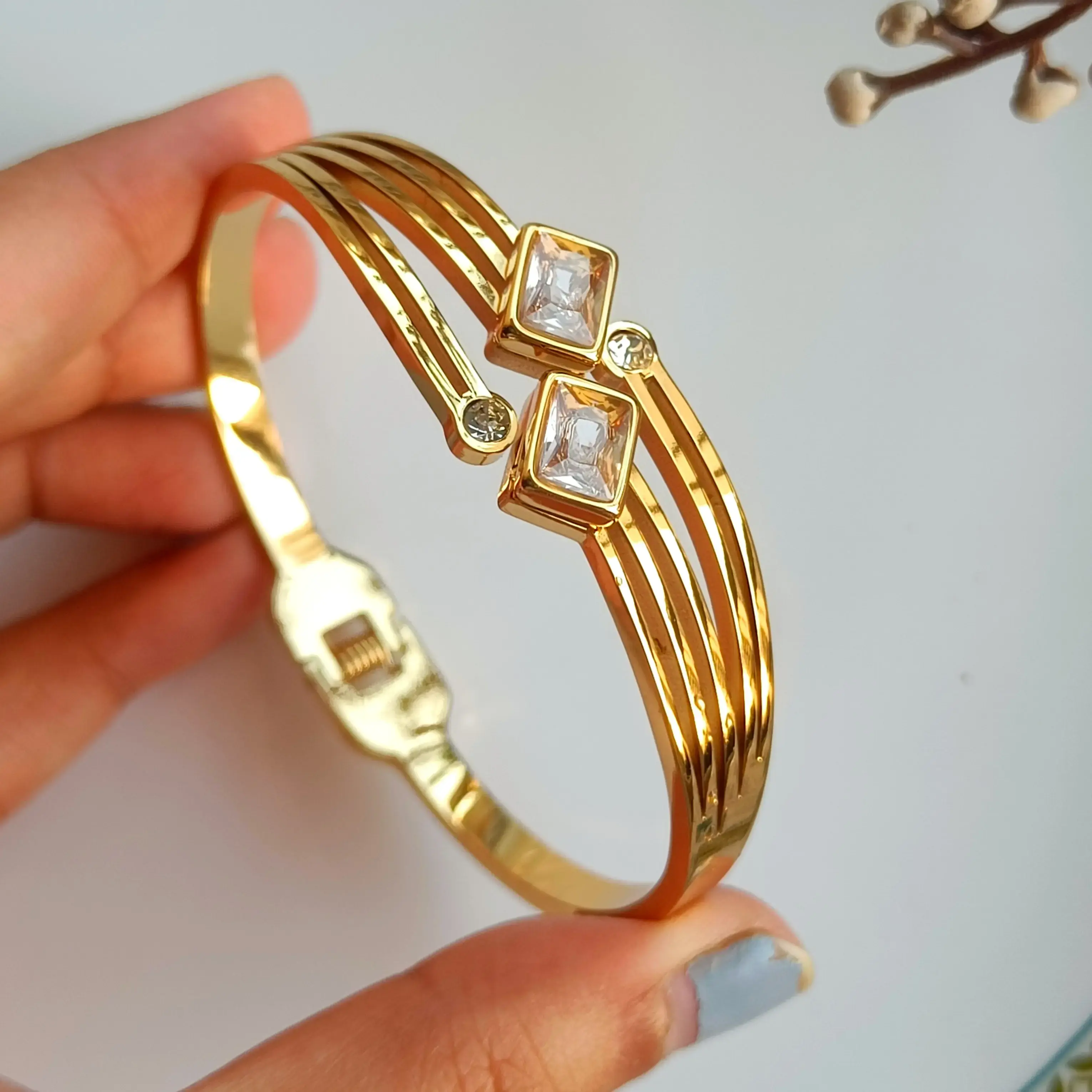 Gold toned multi-strand cuff bracelet