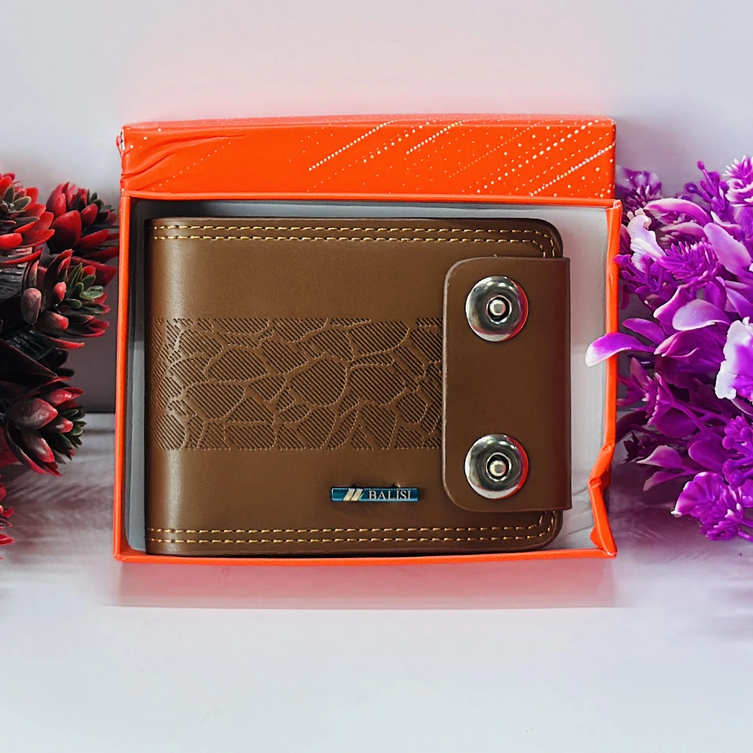 brown men's BALISI wallet with a textured pattern and snap closure.