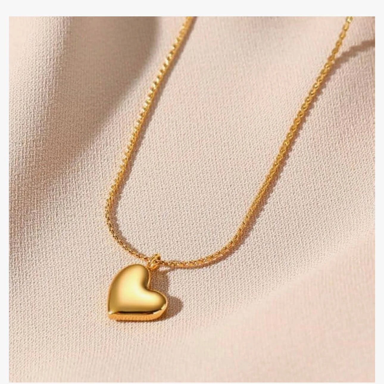 Gold plated anti-tarnish stainless steel heart pendant necklace by YC Jewelry.