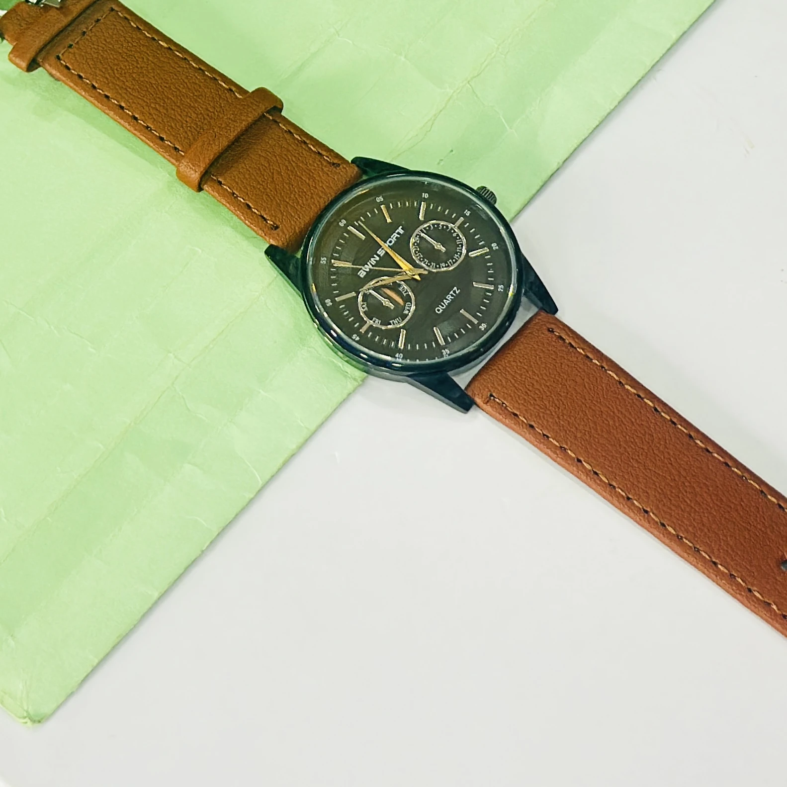 appears to be an AWIN SPORT quartz watch
