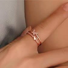 Rose gold plated cubic zirconia butterfly double band ring.