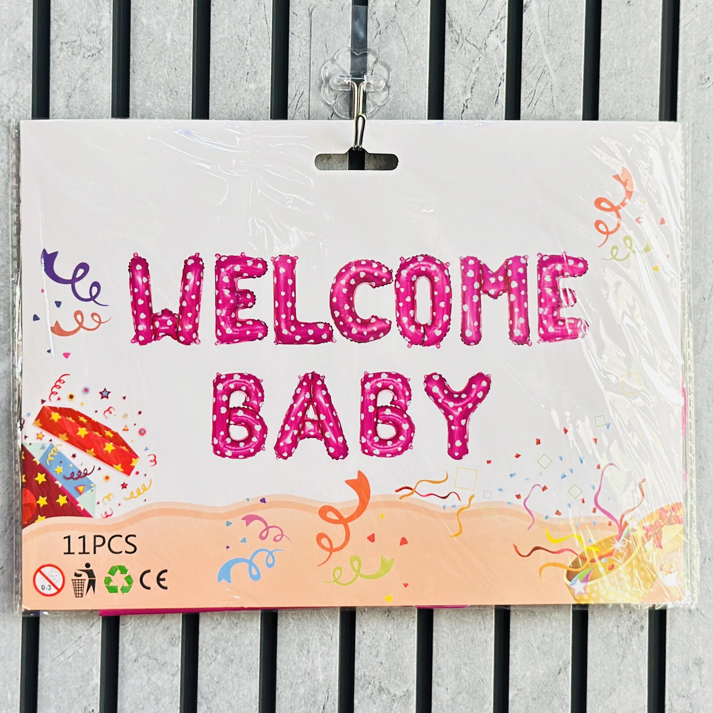 11-piece polka dot pink Welcome Baby foil balloon set
