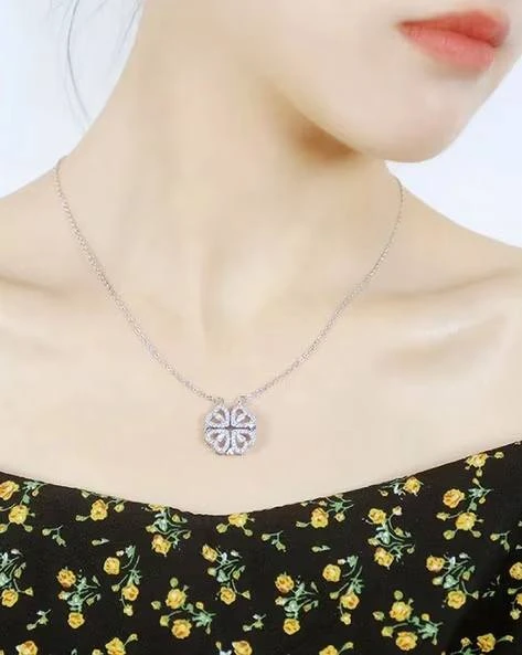 silver-toned, magnetic four-heart clover pendant necklace made of stainless steel