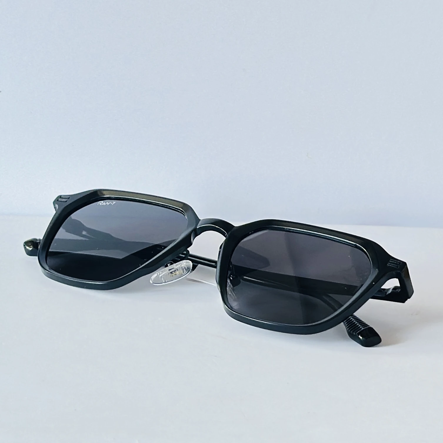 pair of black metal hexagonal sunglasses